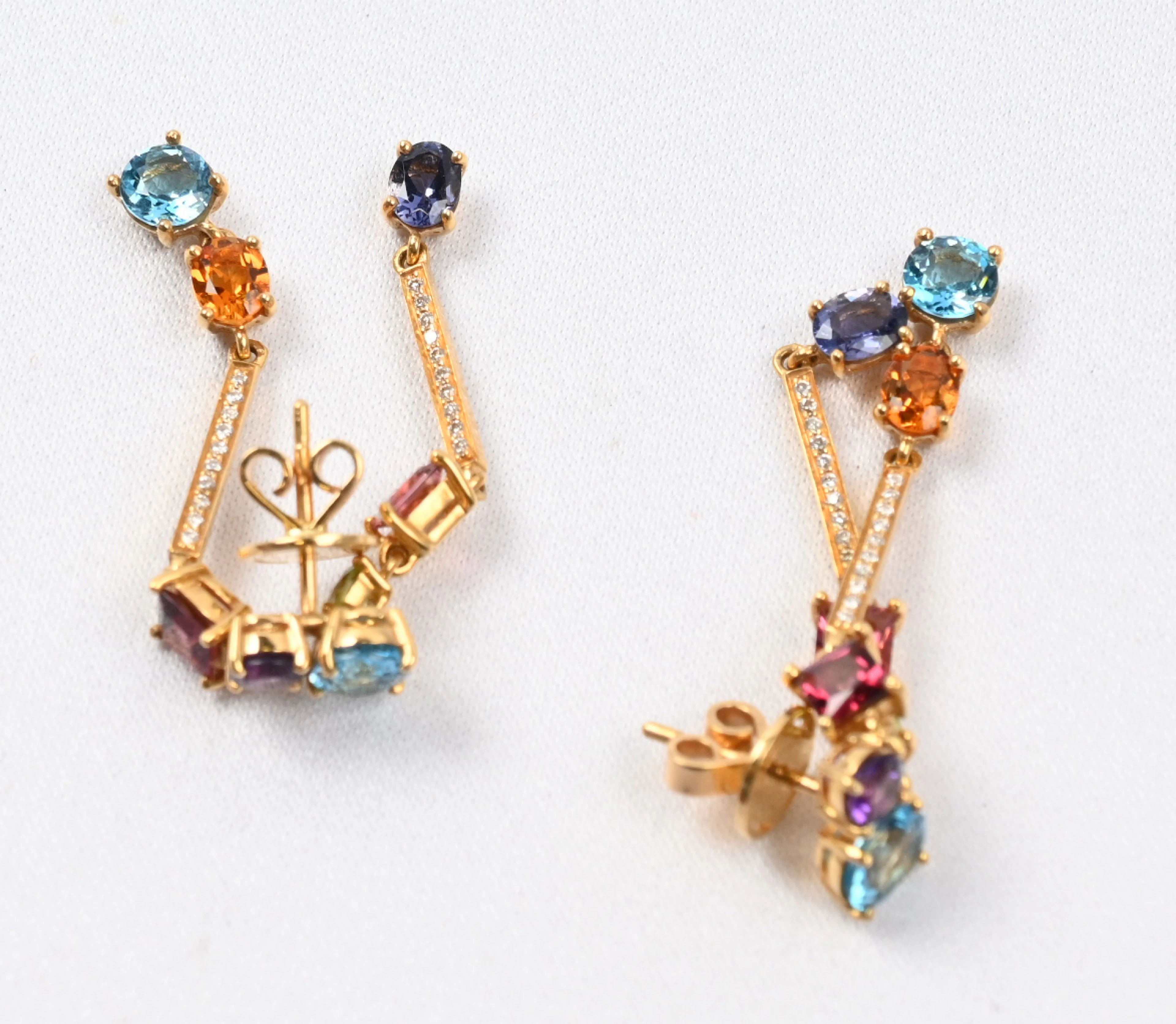 Diamond earrings with colorful stones, gold (750). Gross weight approximately