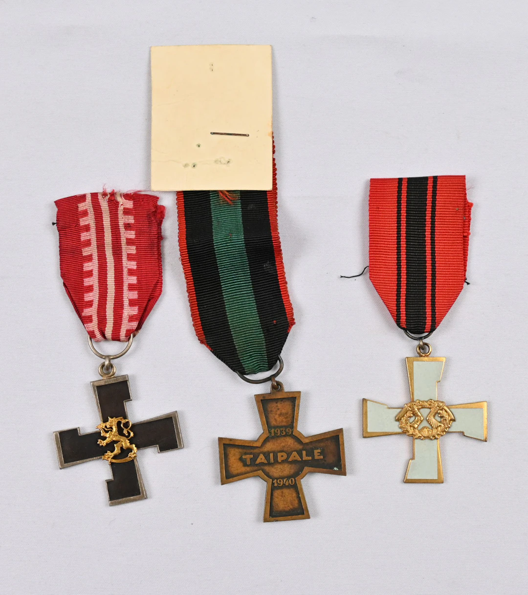 Taipale Cross, Headquarters commemoration cross and Karelian Cross.