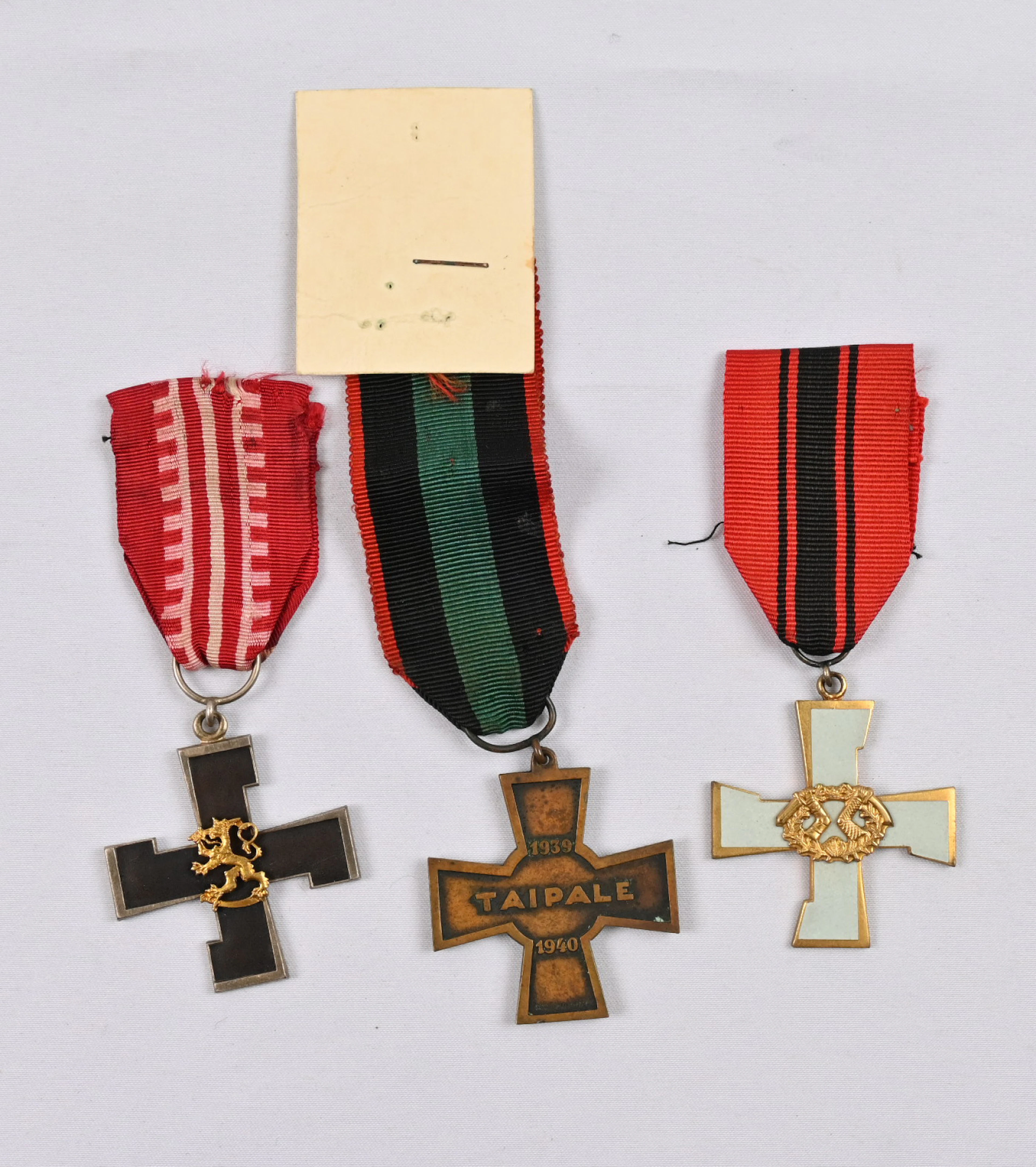 Taipale Cross, Headquarters commemoration cross and Karelian Cross.