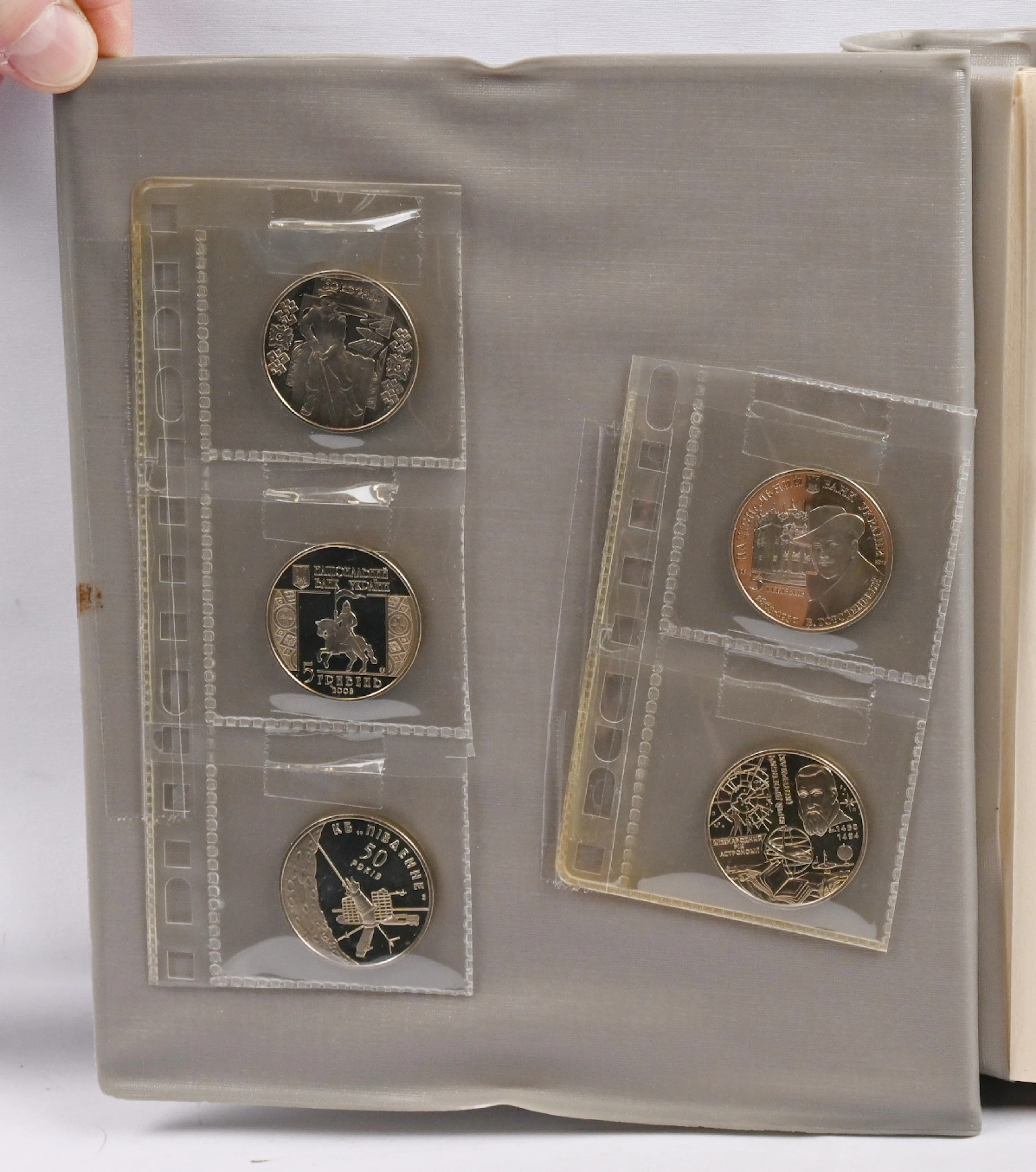 Coins of former Soviet republics versatile selection in an album.