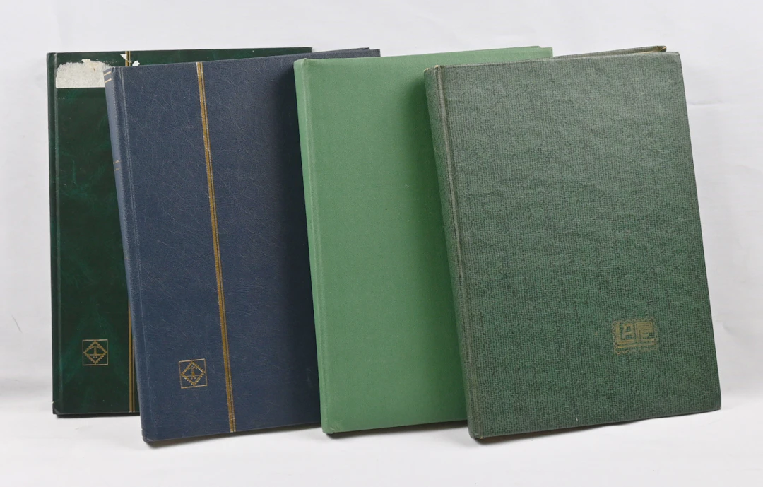 Stamps of different German areas in four stockbooks, mainly West Germany