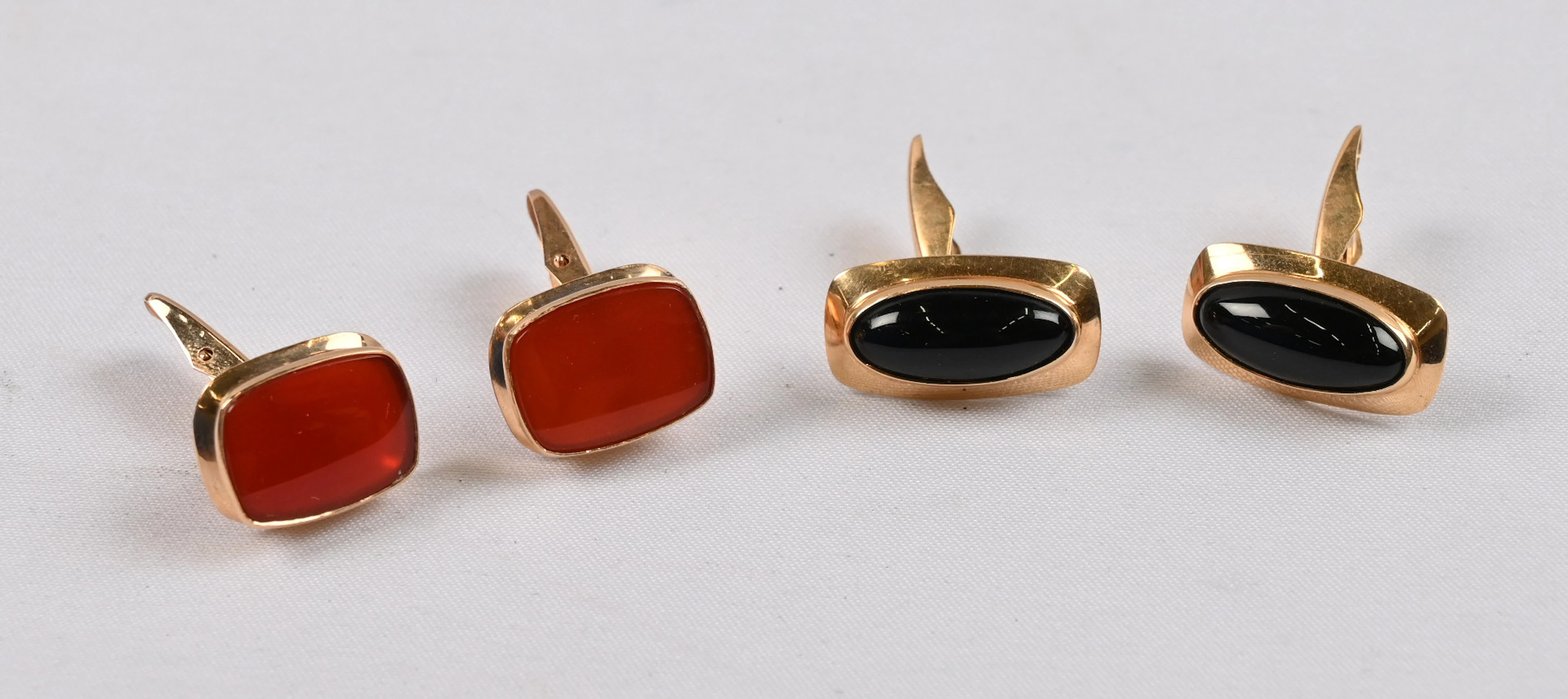 Cufflinks two pairs. Gold (585) with gemstones. Gross weight approximately