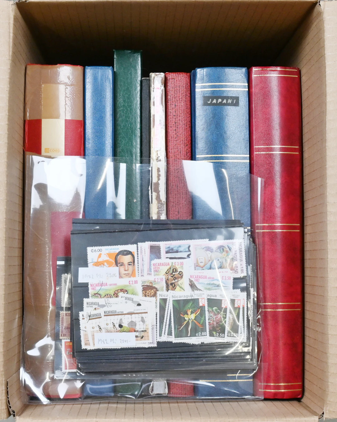 In eight albums mixed stamp selection, including eg. Japan, Memel