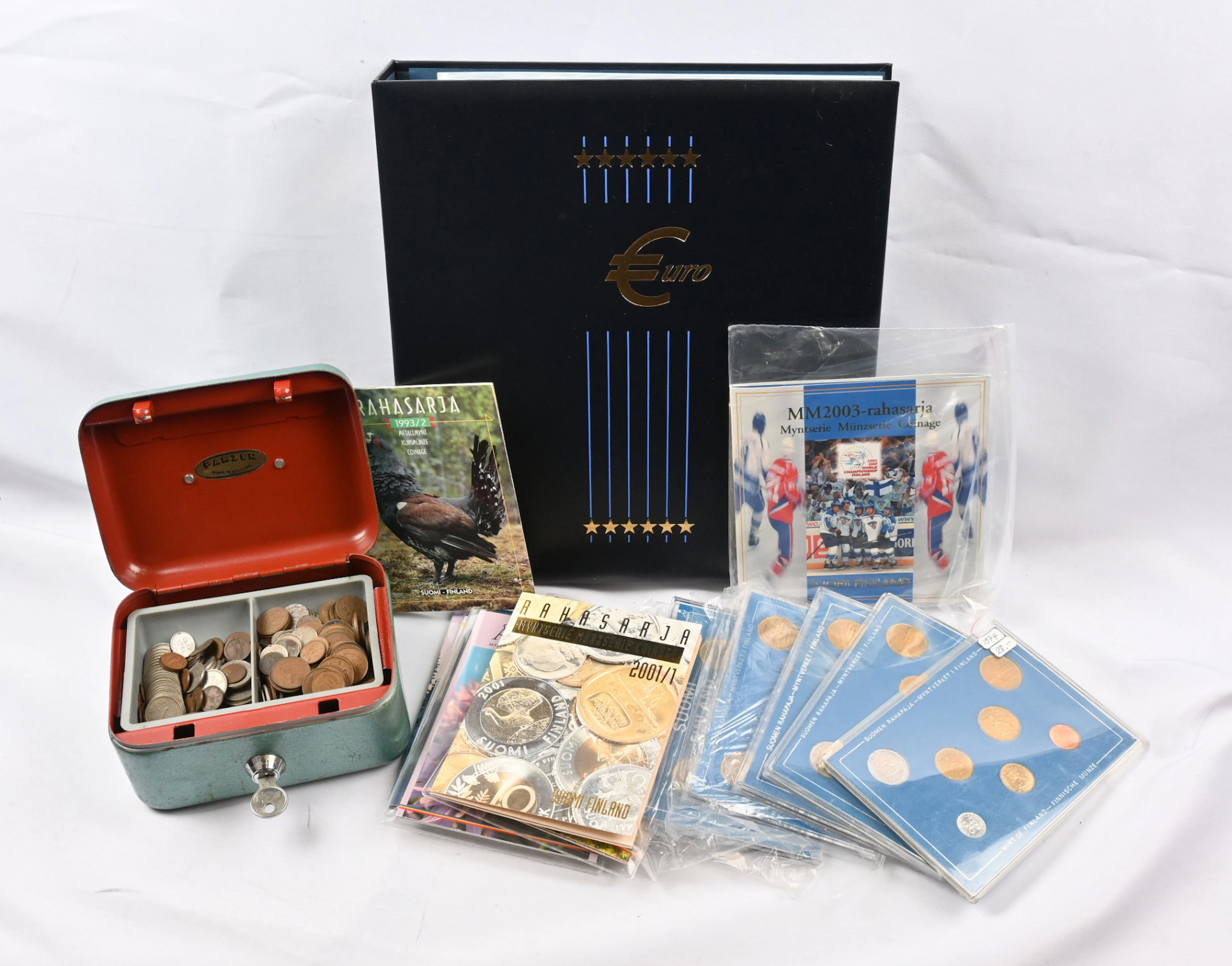 Euro coins small collection in an album as well as coin sets and bulk