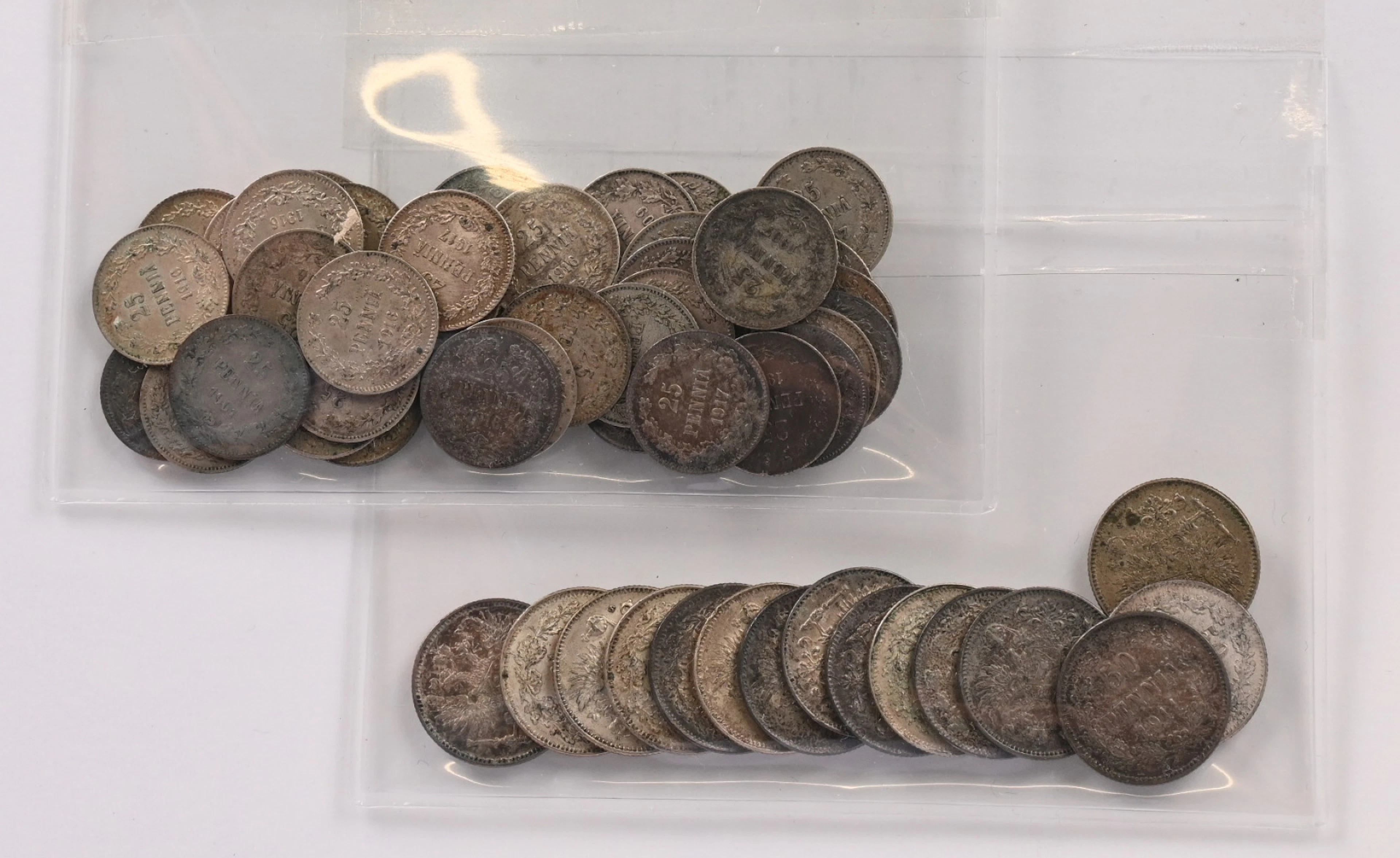 Silver selection 1897 - 1917 25 penni 43 pieces. 50 penni 15 pieces.