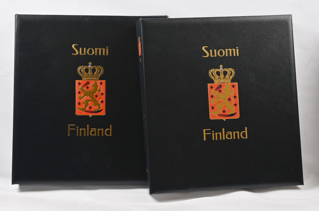 2000 - 2021 two almost empty albums with mounts and slipcases. Not