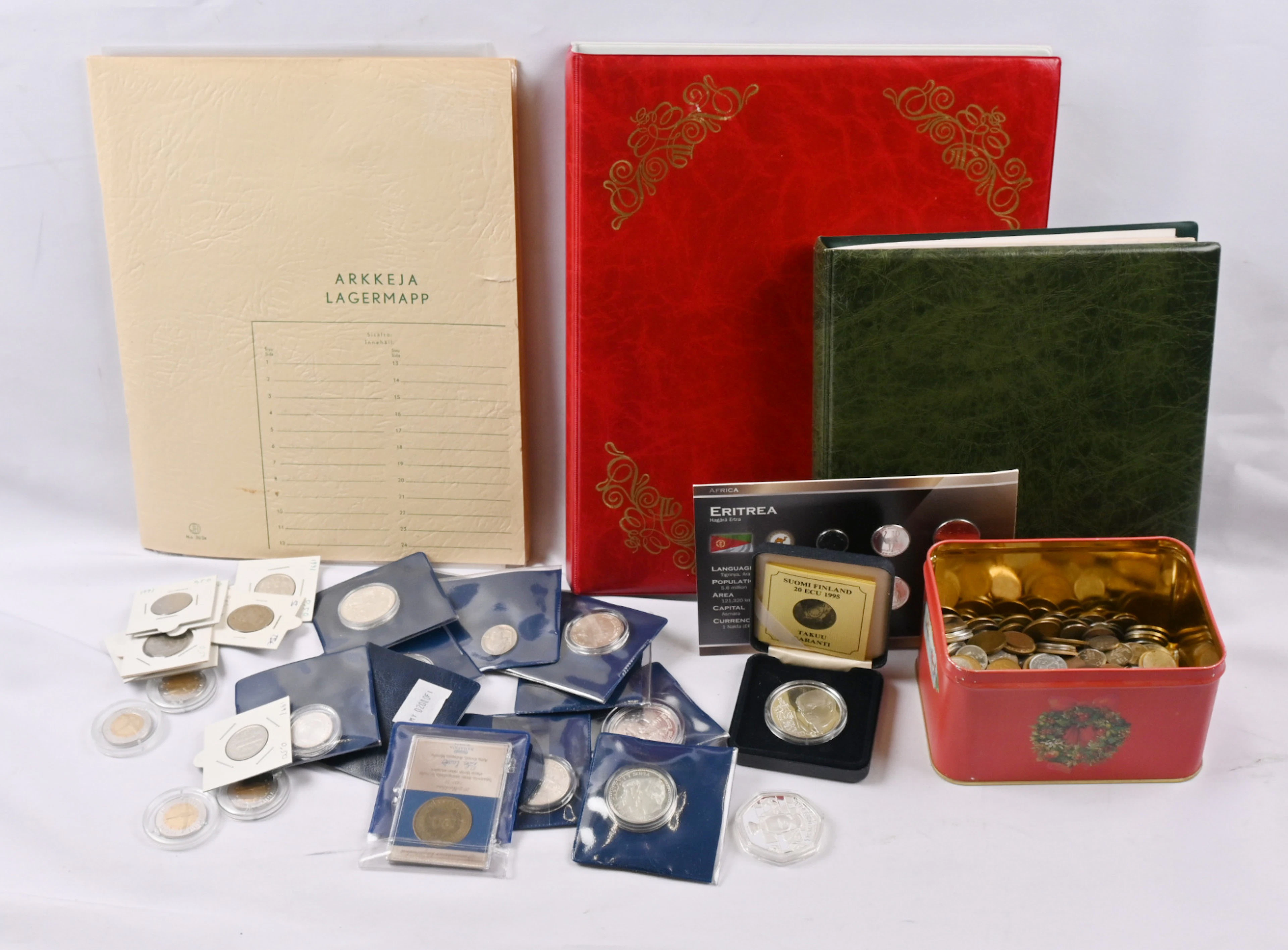 Selection of foreign and Finnish coins as well as banknotes, over