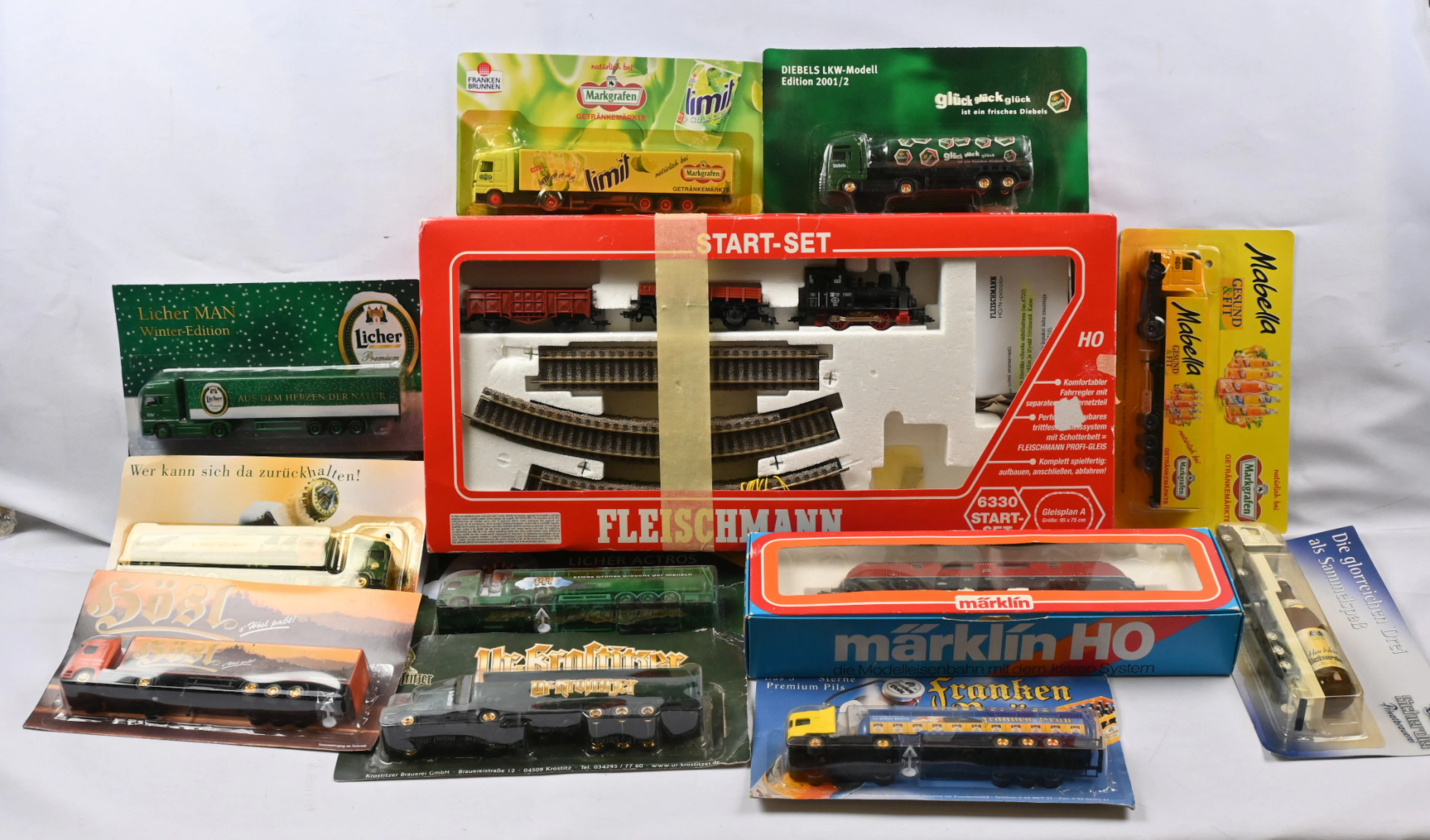 Toys, model railway parts and trains including eg. Märklin overhead