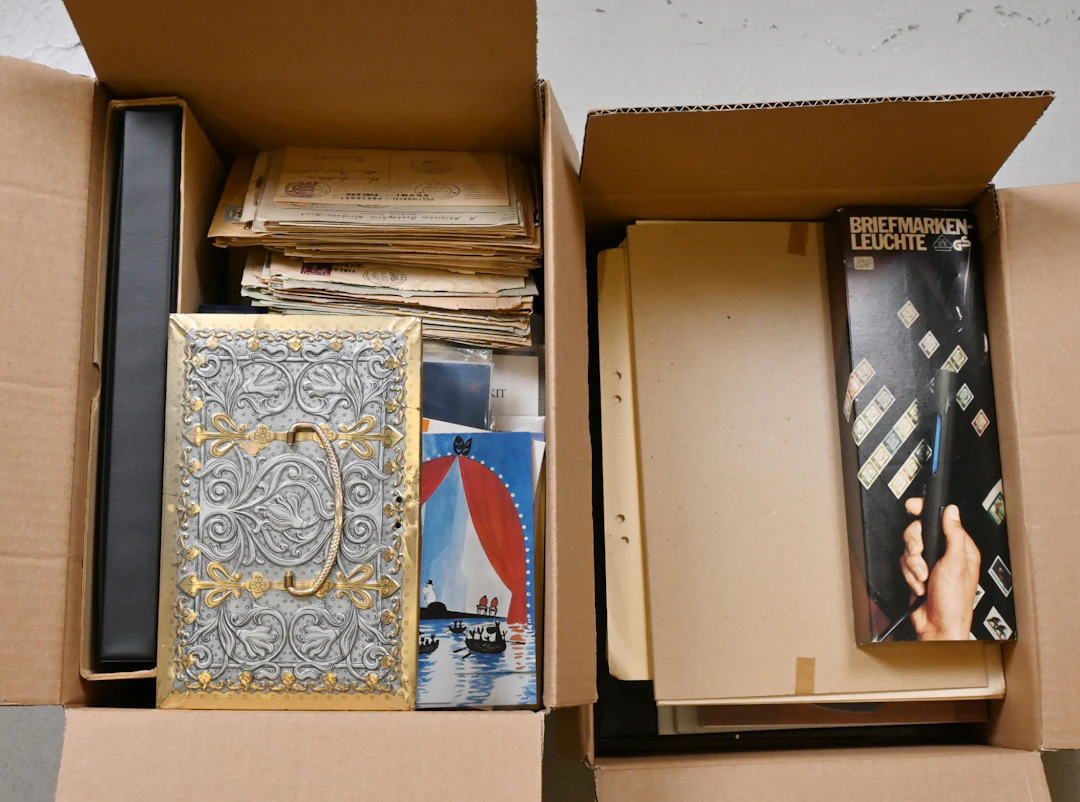 Mixed selection of philately and accessories in two boxes, in total 12 KG.