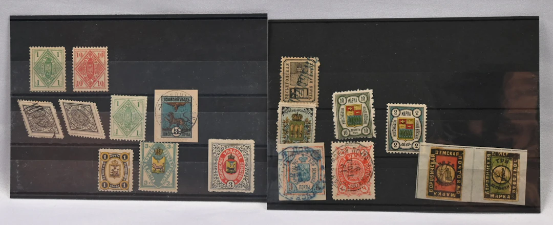 Selection of over 35 stamps, cover front as well as two postal stationeries.