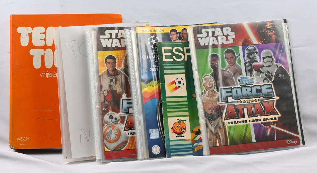 Trading cards in five albums: Pokemon cards, hockey cards (poor quality)