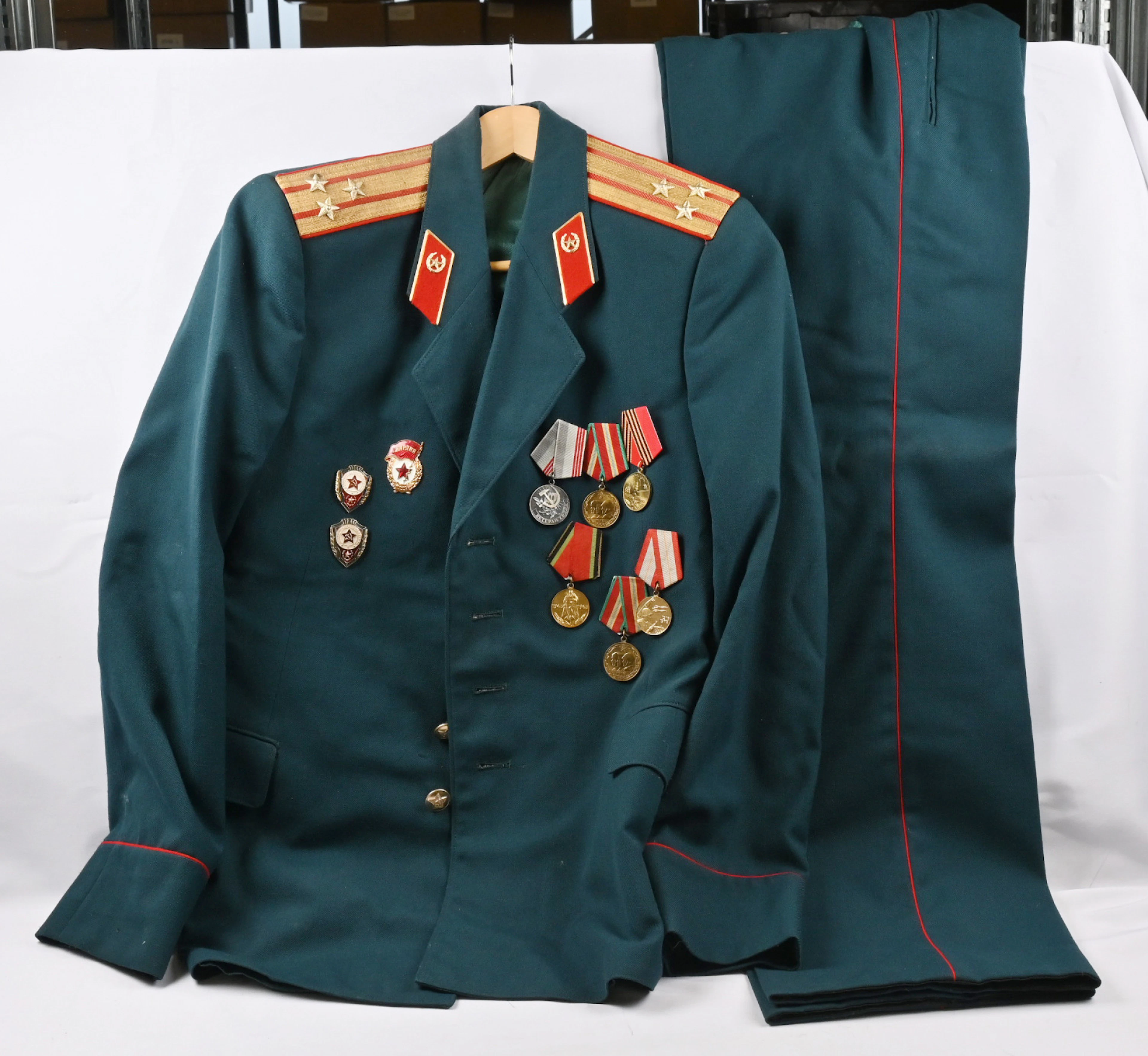 Three uniforms, two of which also with trousers. Conscript jacket
