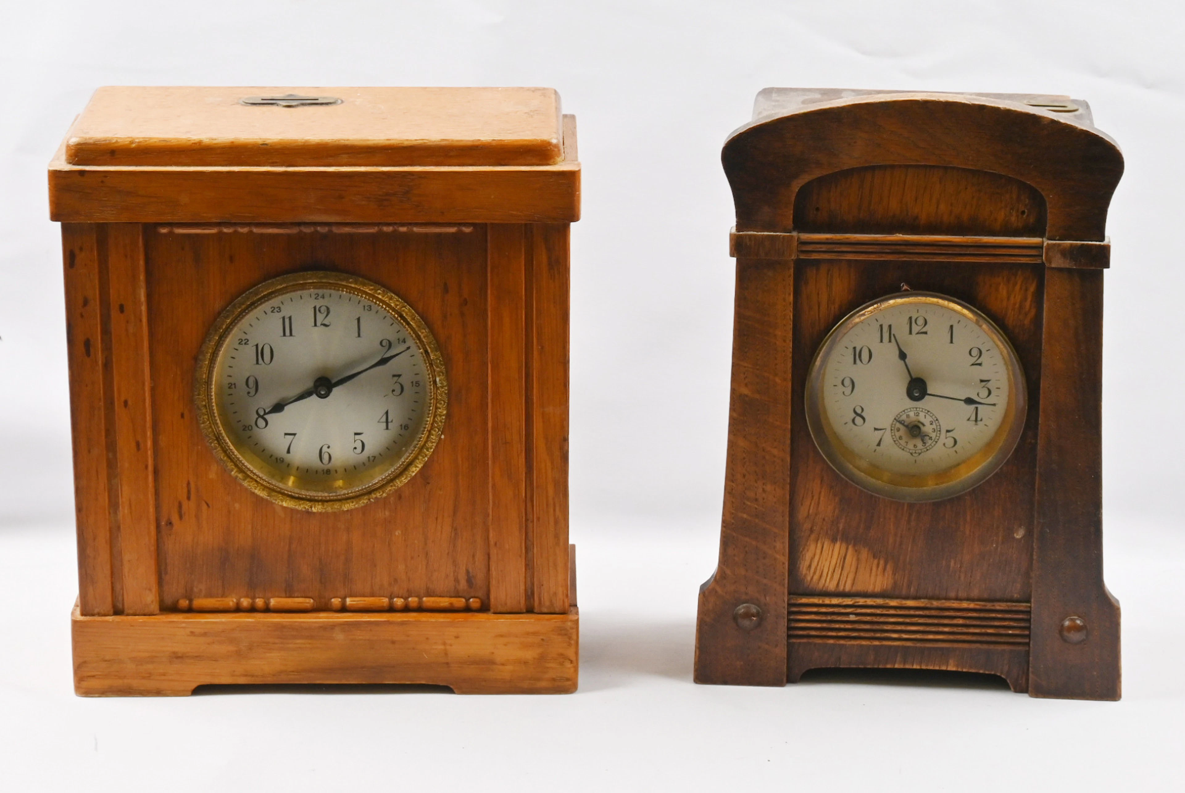 Two different Vedandi savings clocks. Patina and signs of age.