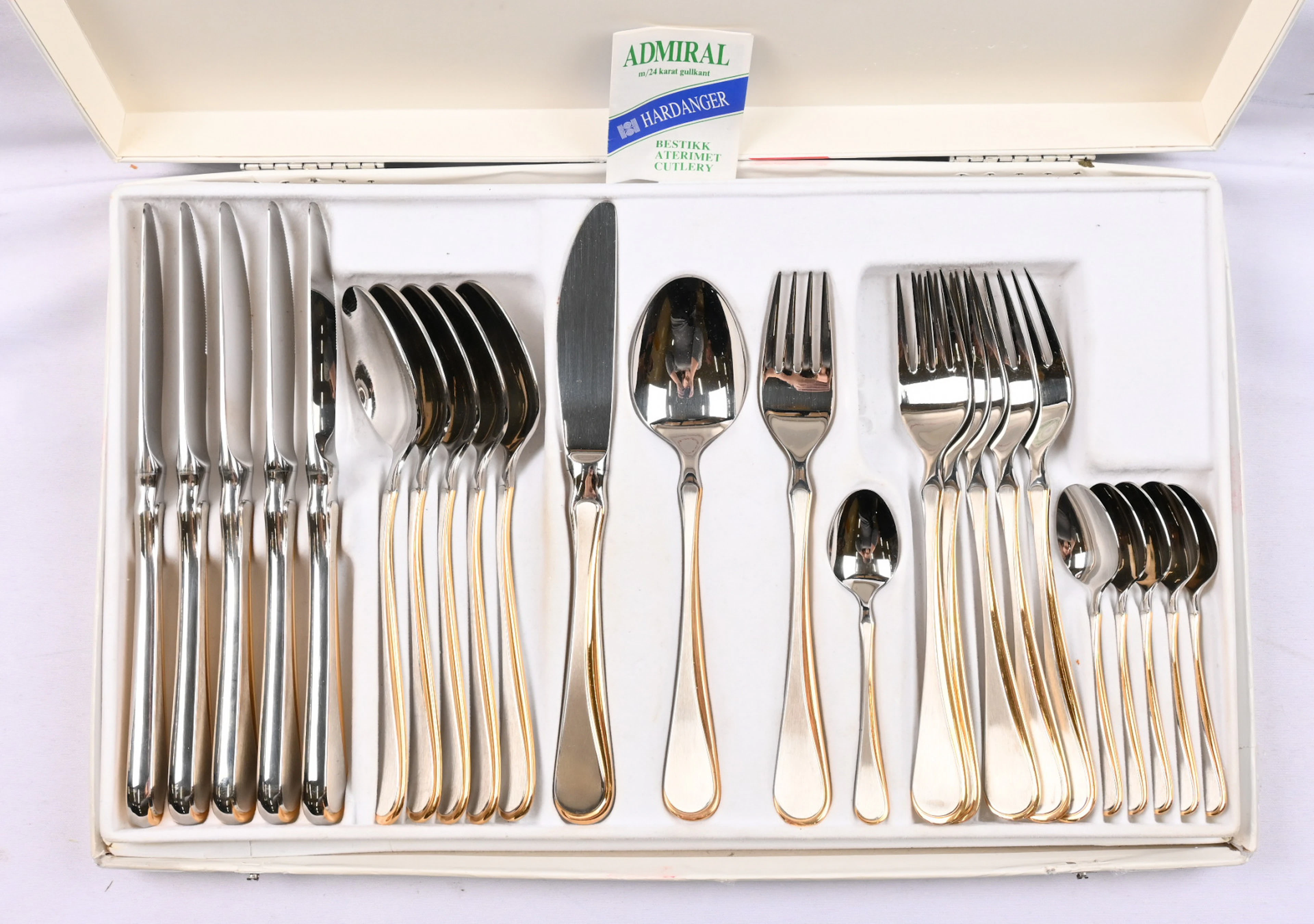 Hardanger cutlery set 24-piece, partial gilding, in the original box.