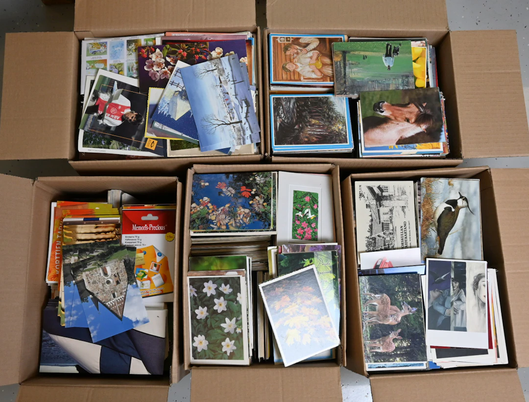 Stock selection of Finnish and foreign cards in five boxes, total
