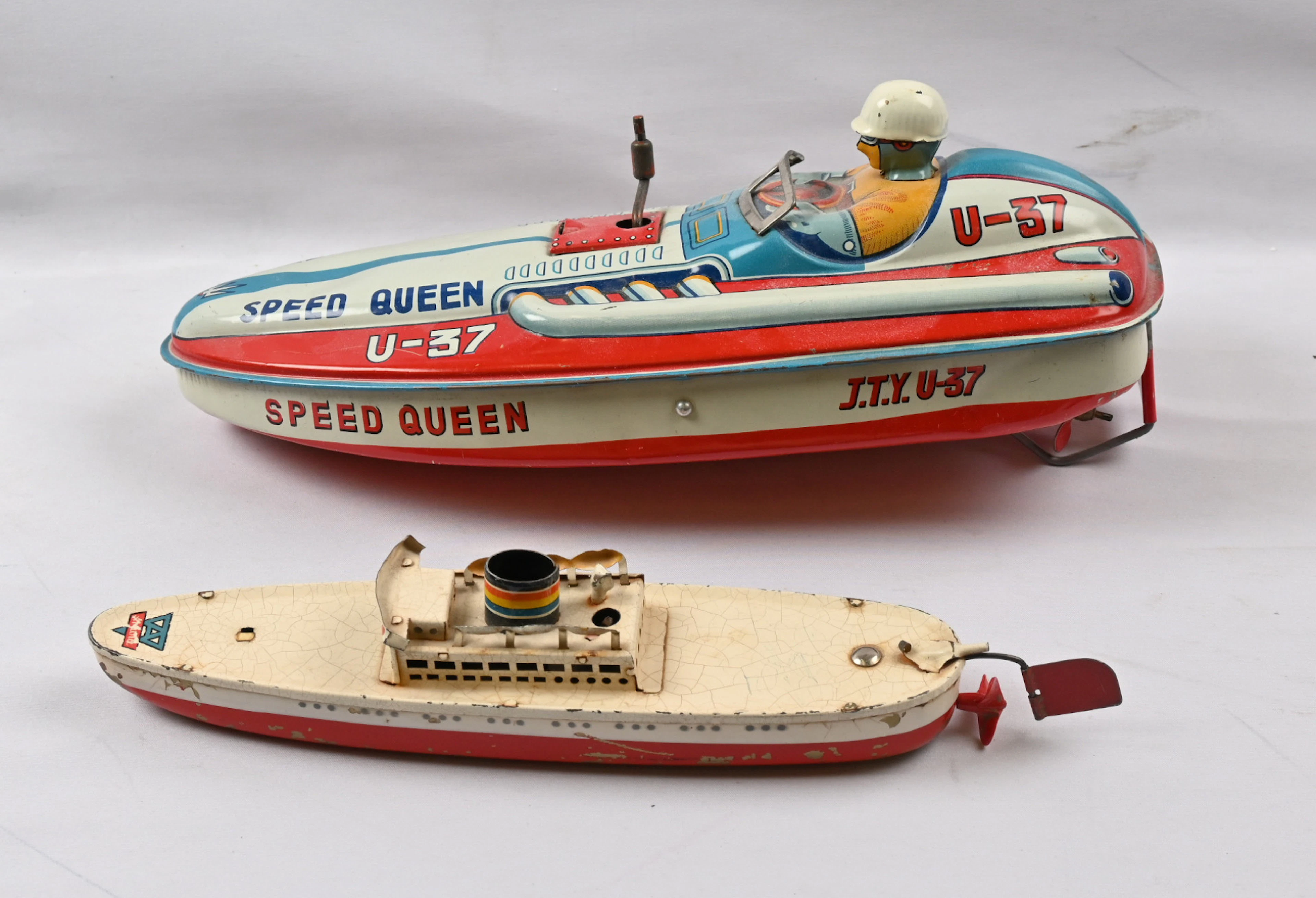 Toys, ship 1930s manufacturer Arnold (Germany) and boat from the 1950s