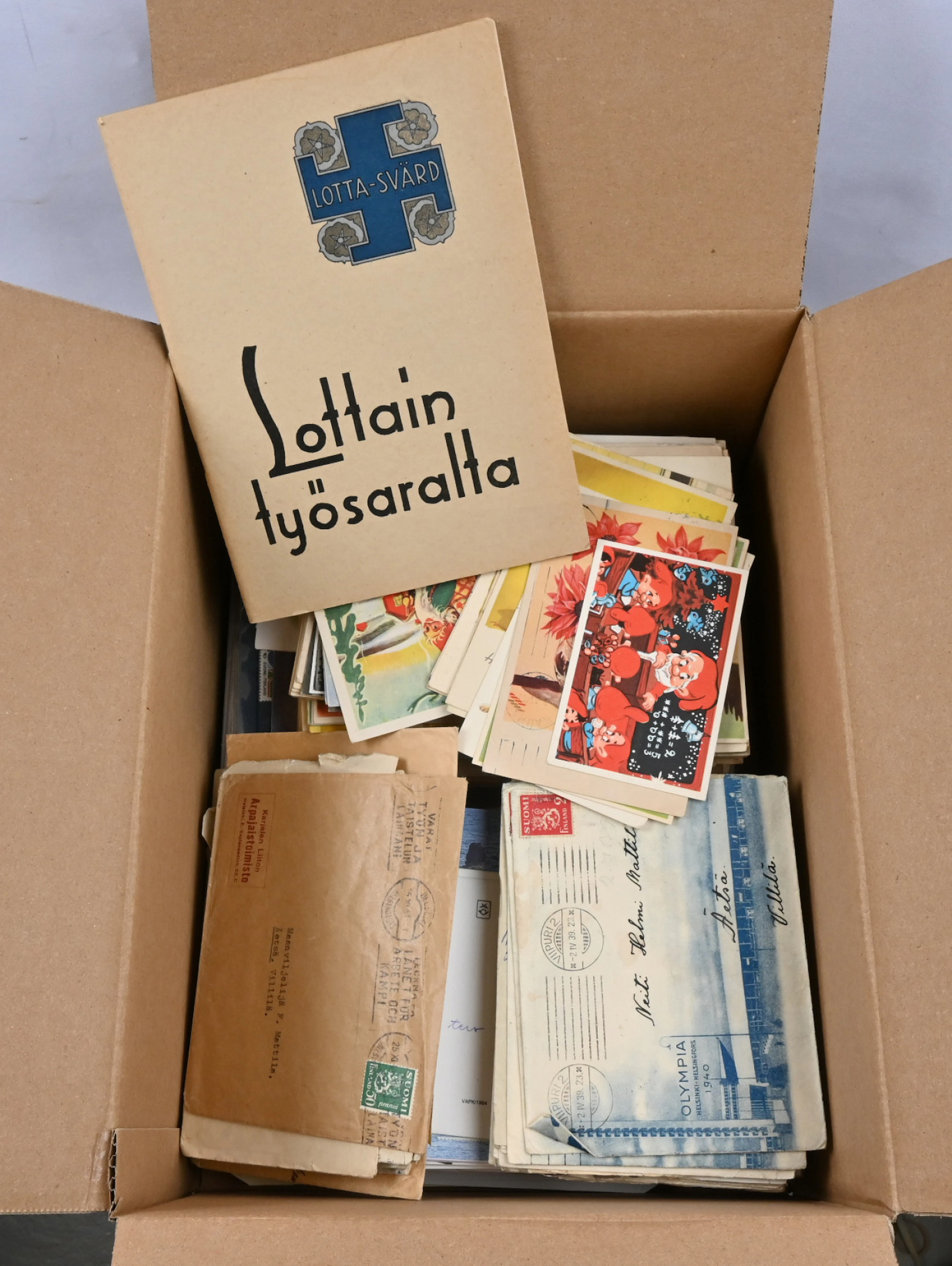 Box including selection of mixed material: cards, first day covers