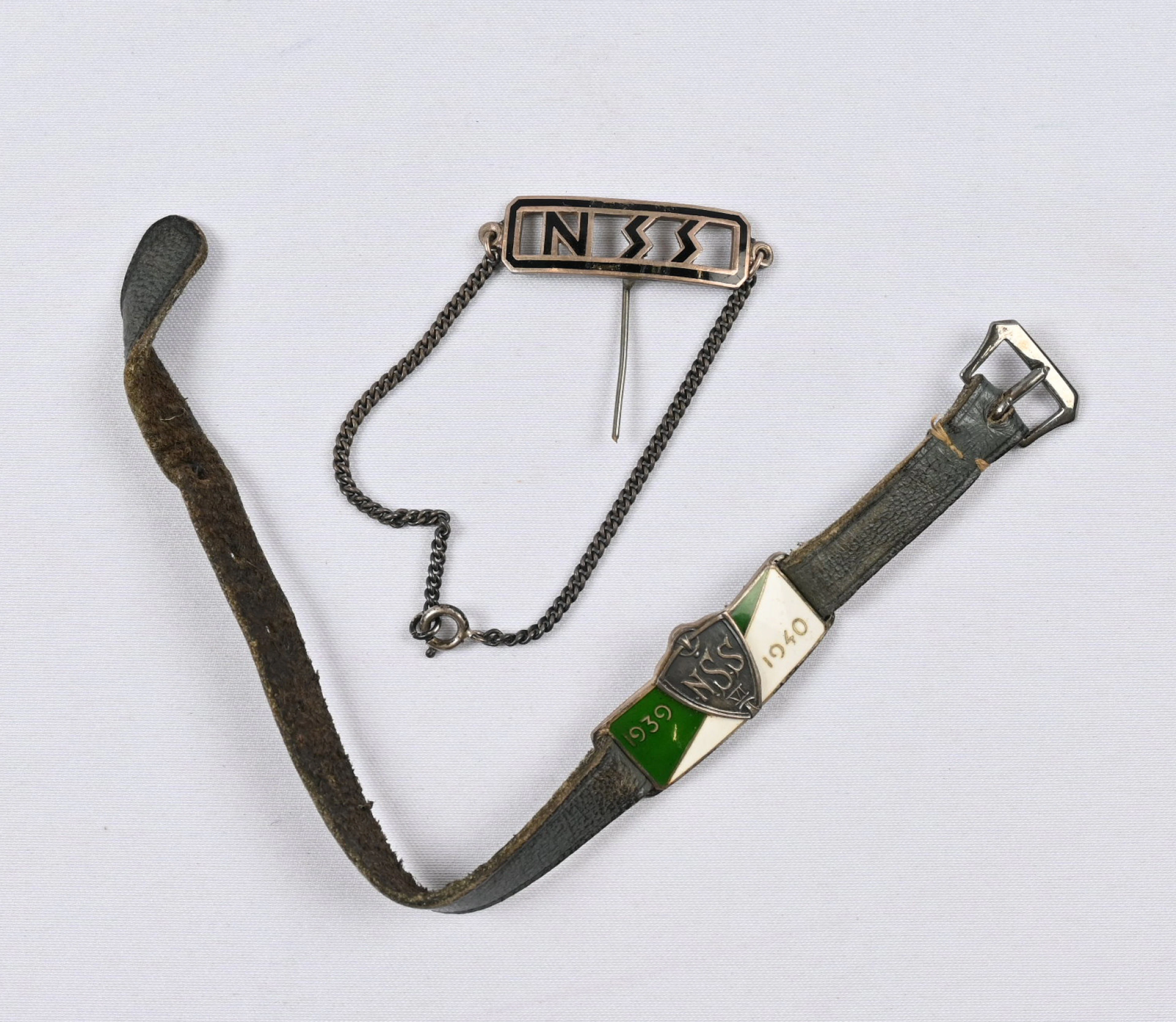 Student council emblems of Nya Svenska Samskolan badges: a bracelet