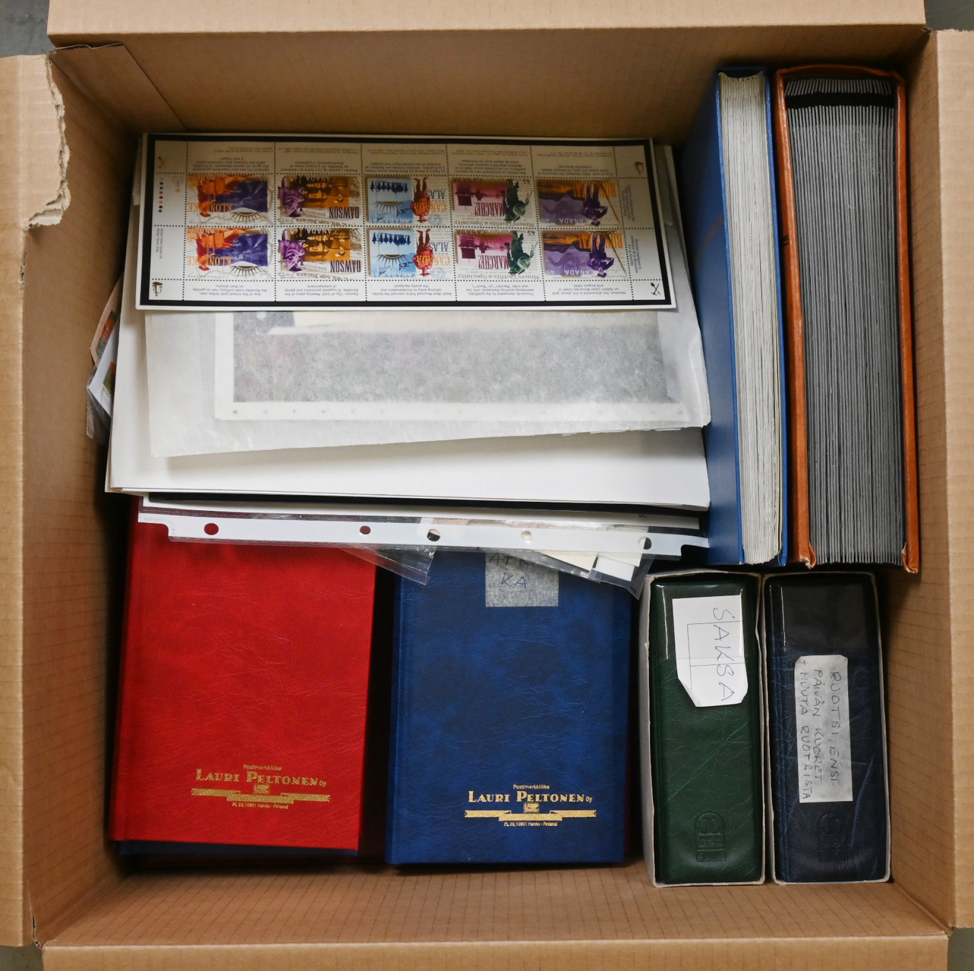 Worldwide, mixed material of stamps and postal items/FDCs, total over