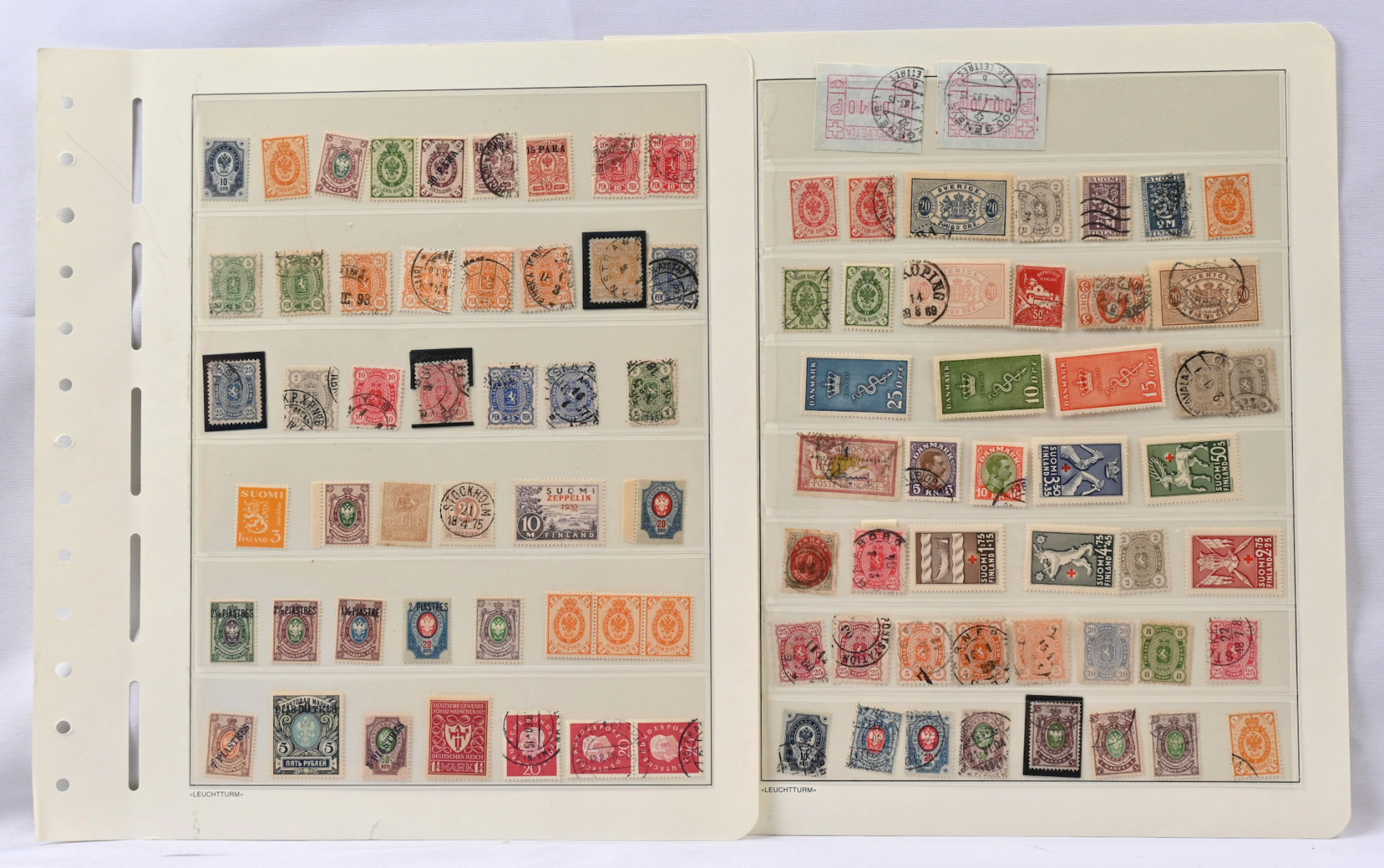 Stockpages with mixed stamp lot of Finnish material and also some