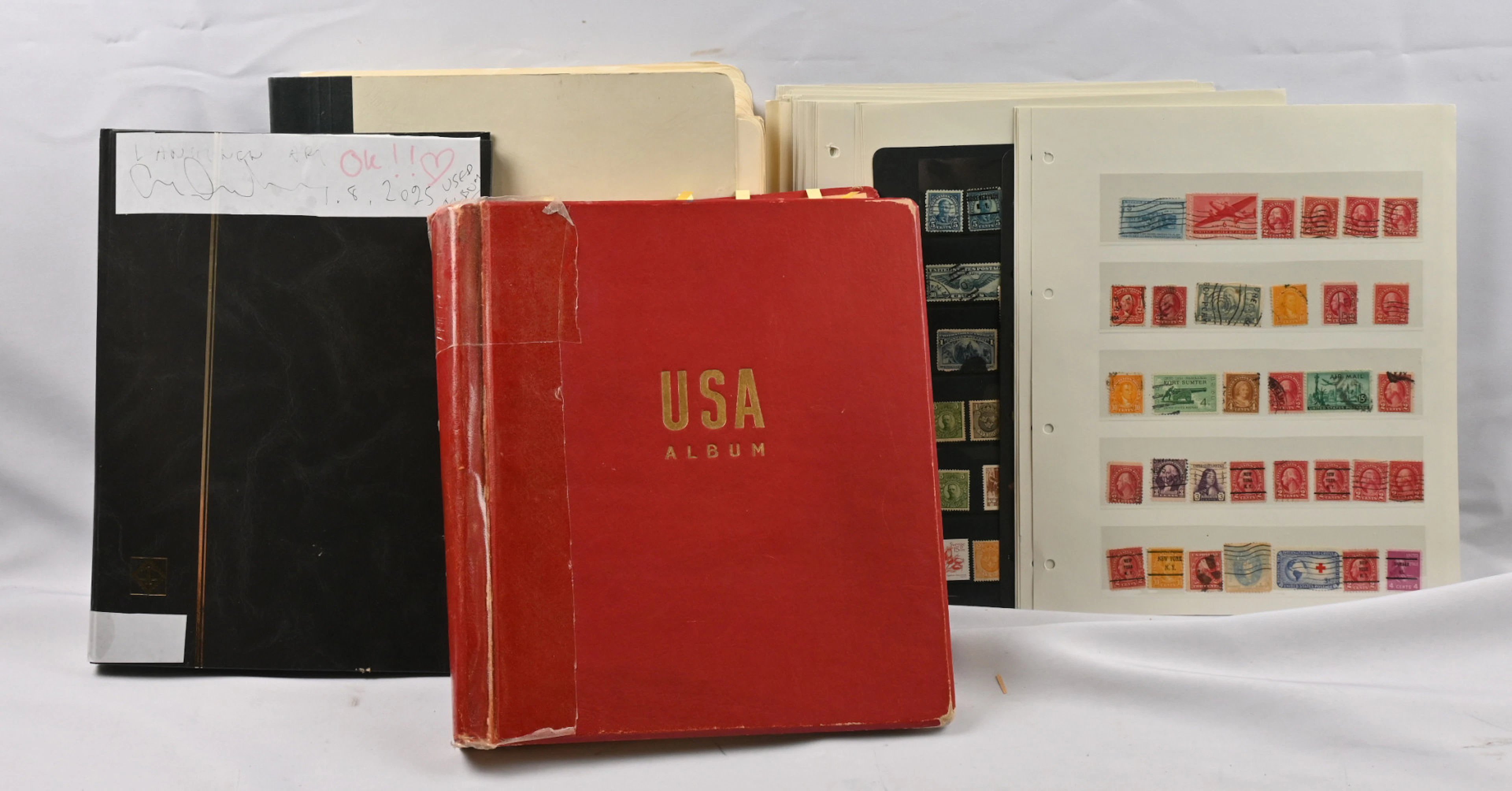 Mixed material in two albums, in a stockbook and on stockpages starting