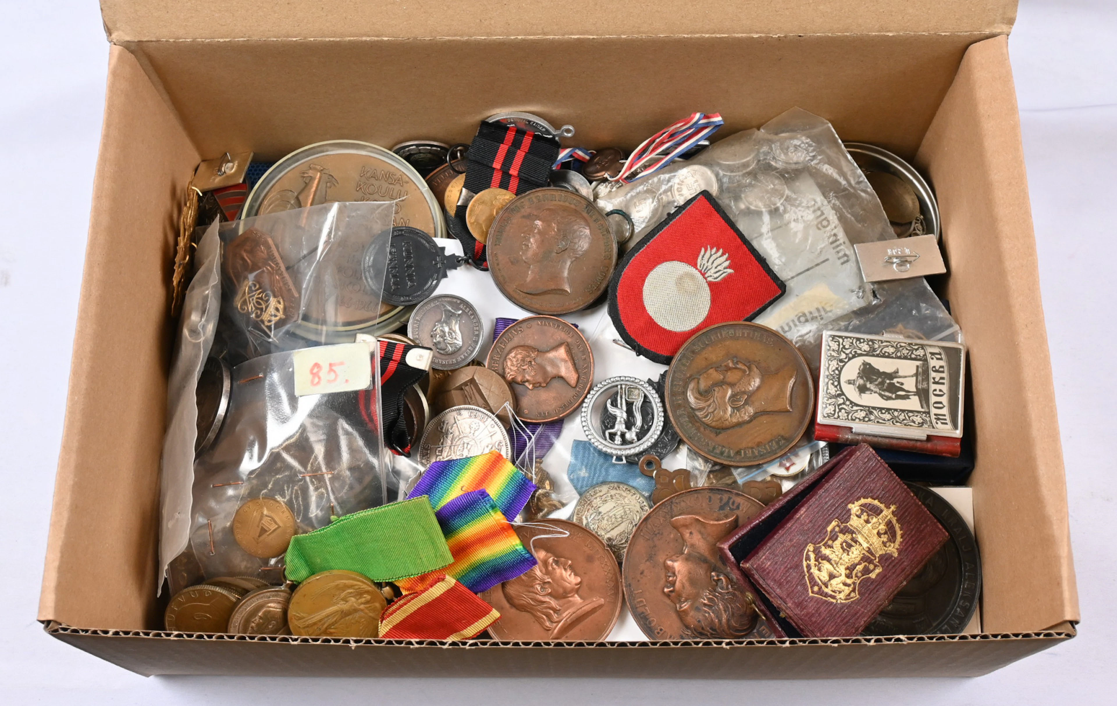 Discovery lot of medals, merit badges, pins etc. interesting material