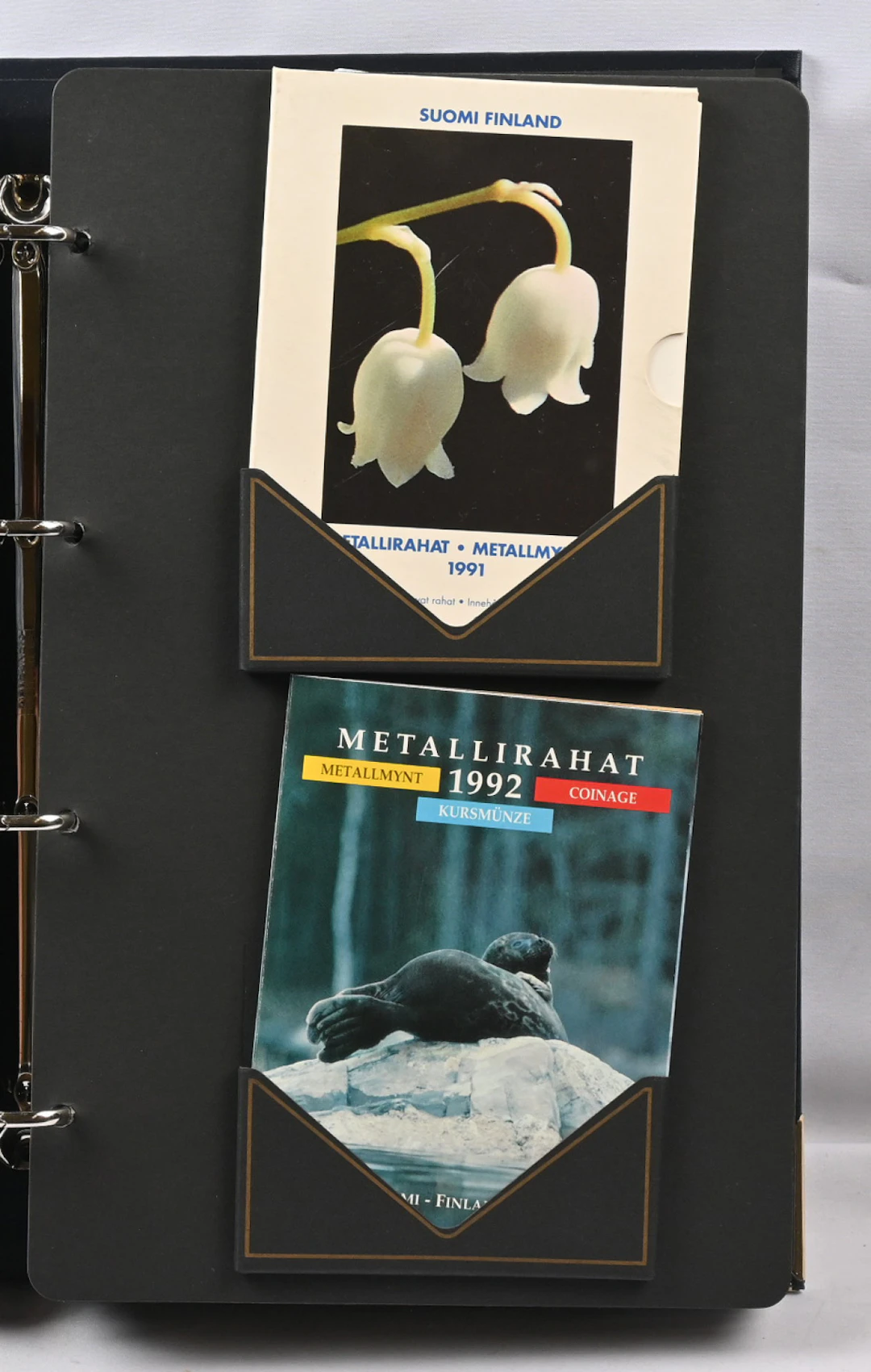 Year sets in a collection album. Contains Mint BU year sets 1990 old