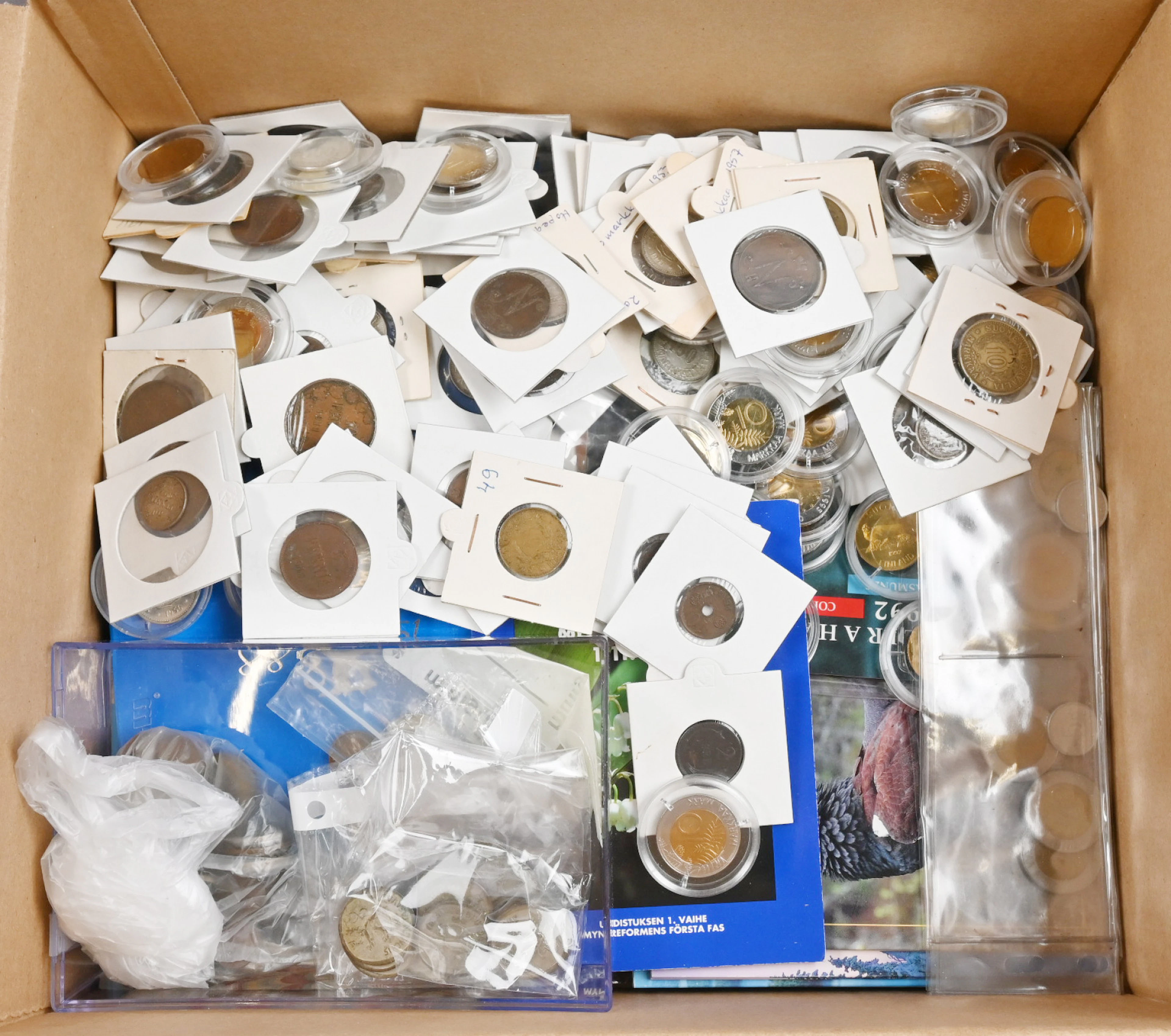 Box including coins starting from 1800s silver coins also coin sets.
