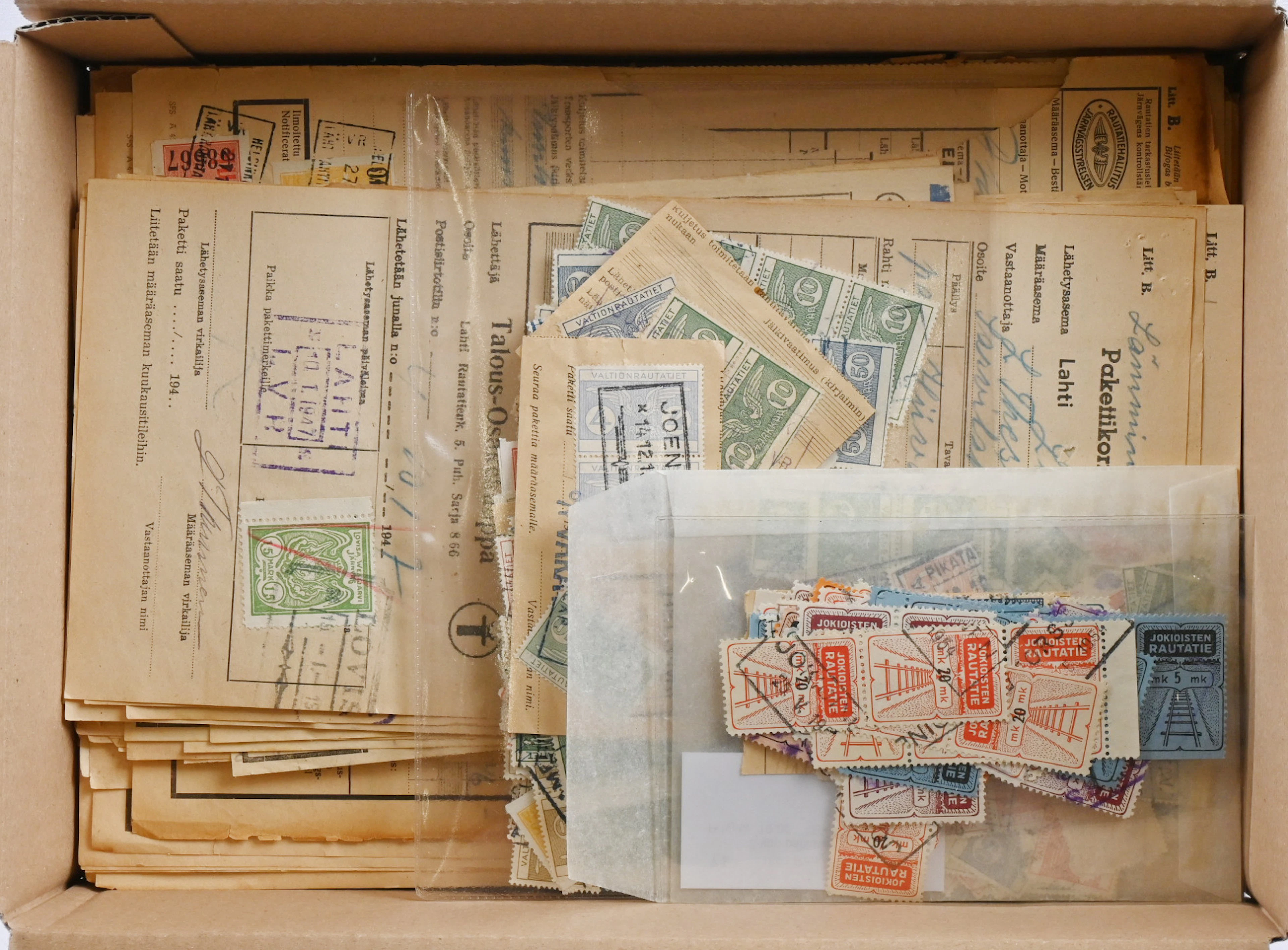 Freight documents and railway stamps, selection in a box