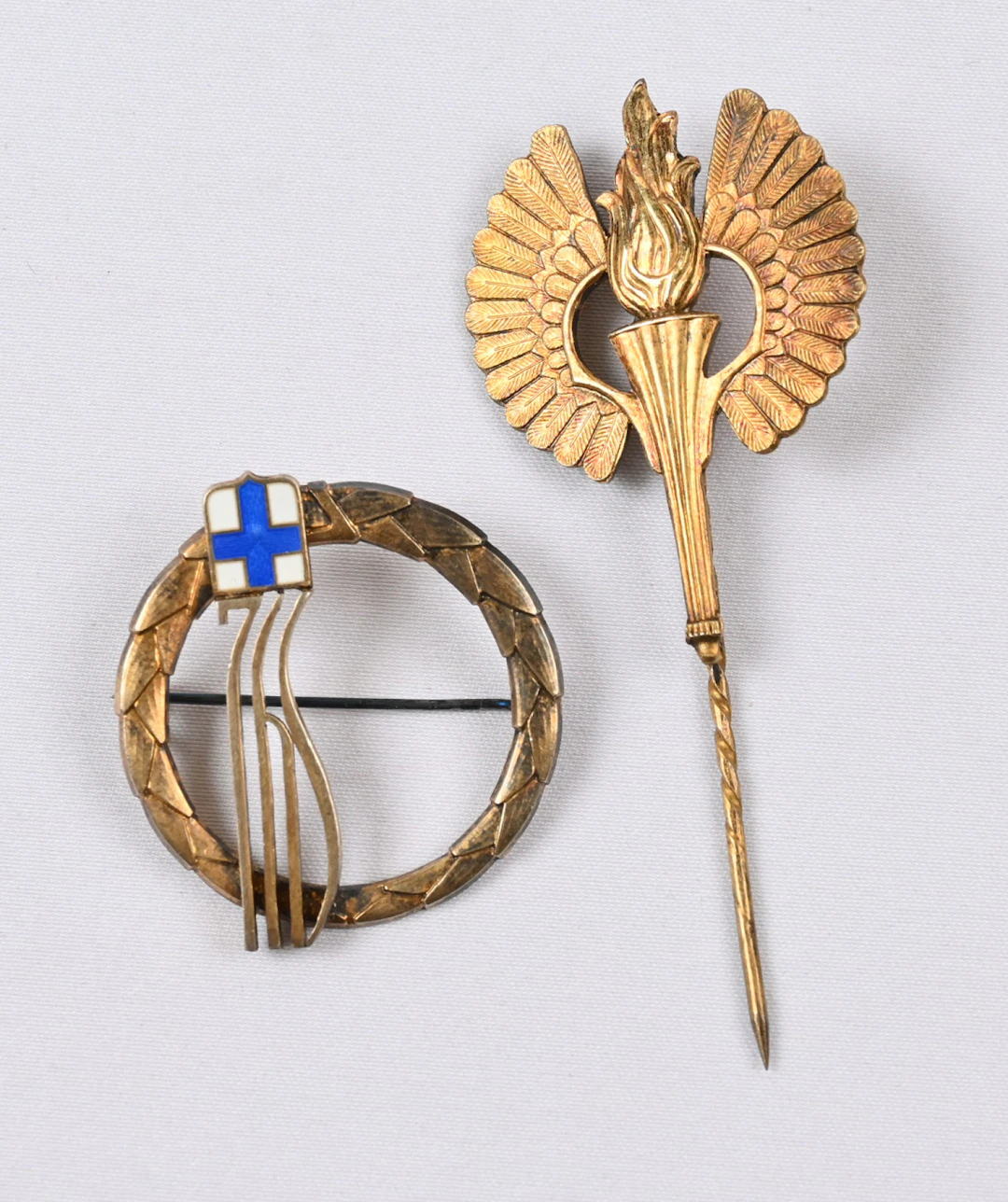 Two different lapel pins belonging to Finnish politician and statesman
