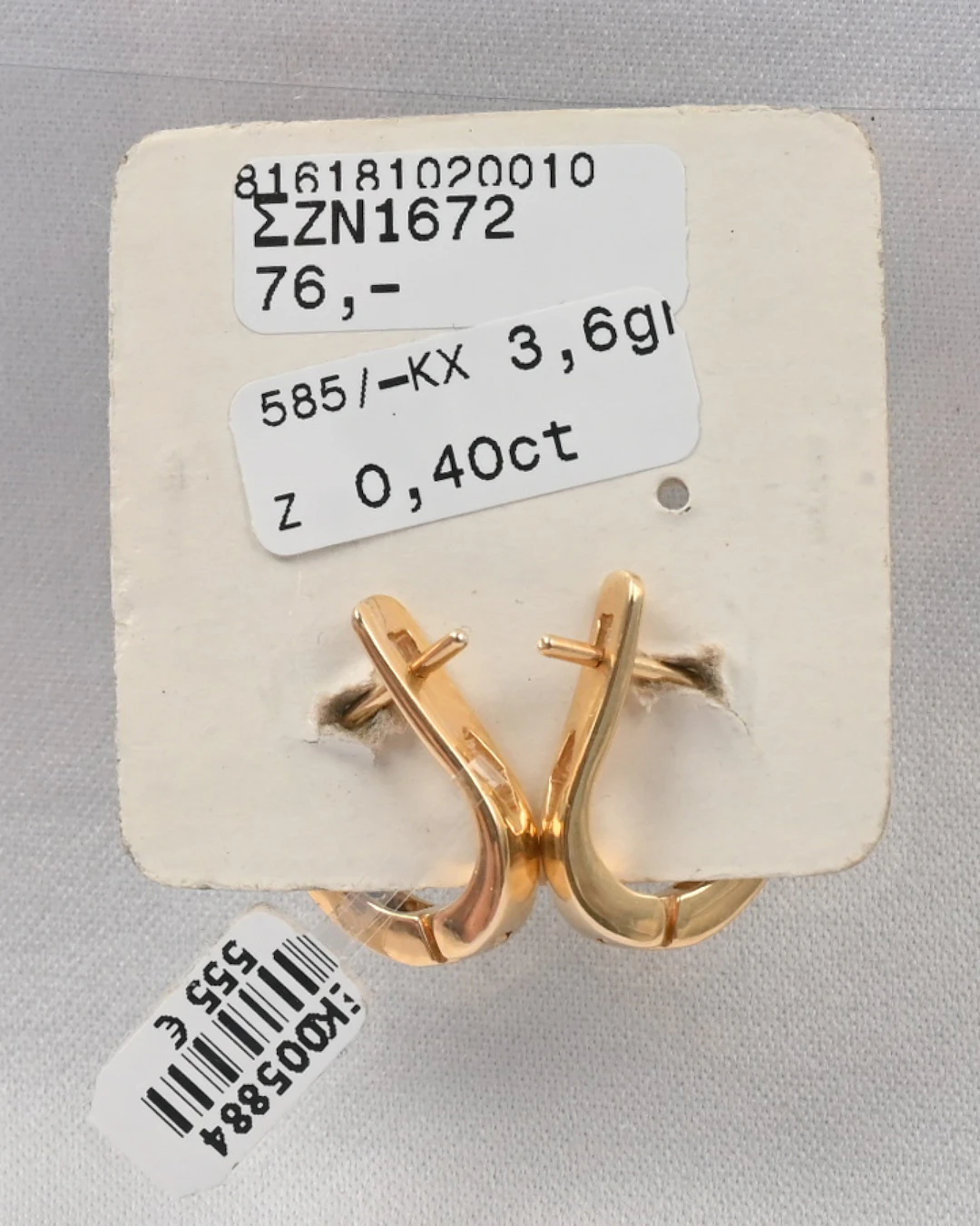 Earrings, zircon, gold (585). Gross weight approximately 3.6 g.
