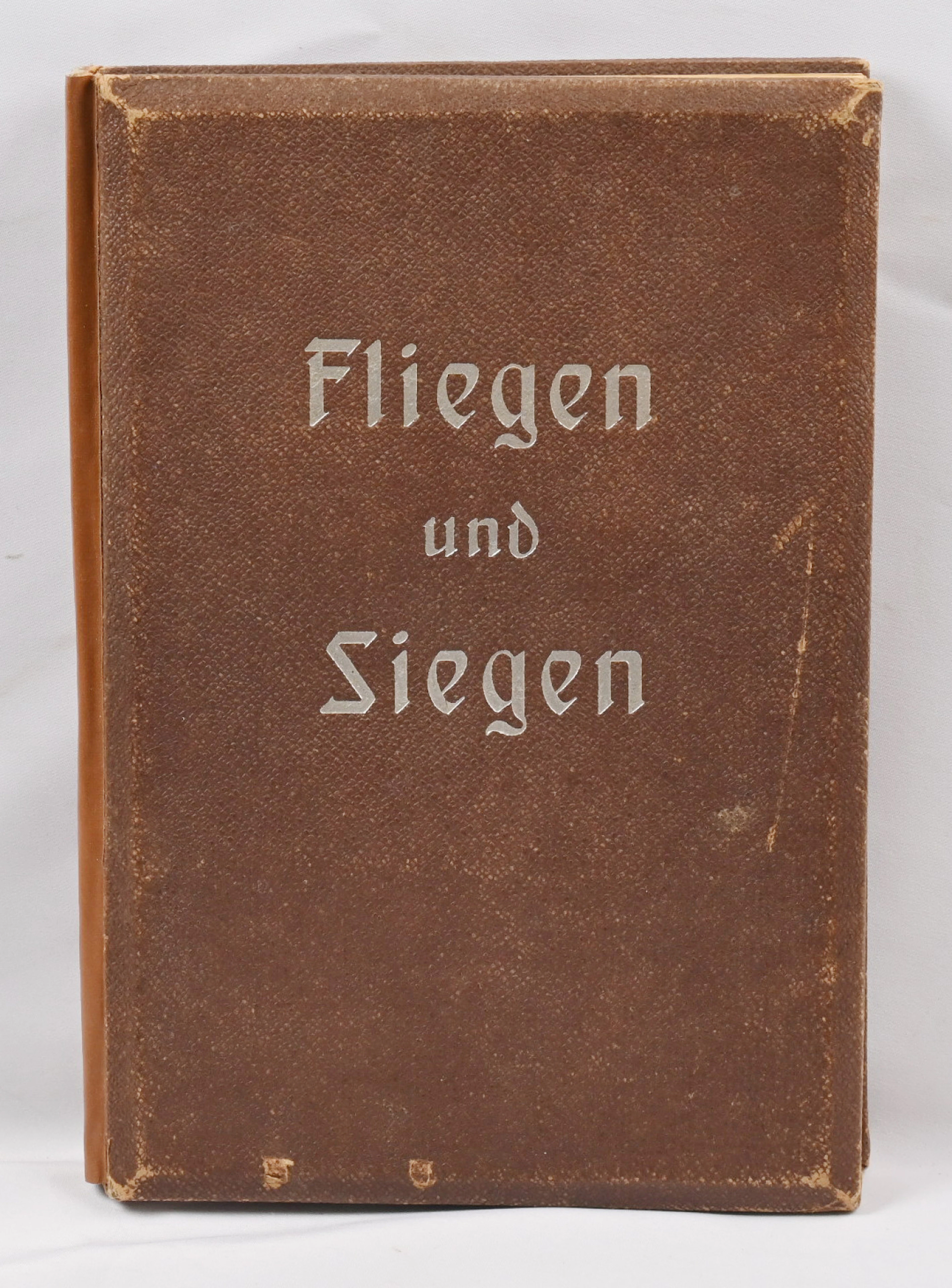 Stereo photo album ”Fliegen und Siegen”. ”3D” photo album. One of