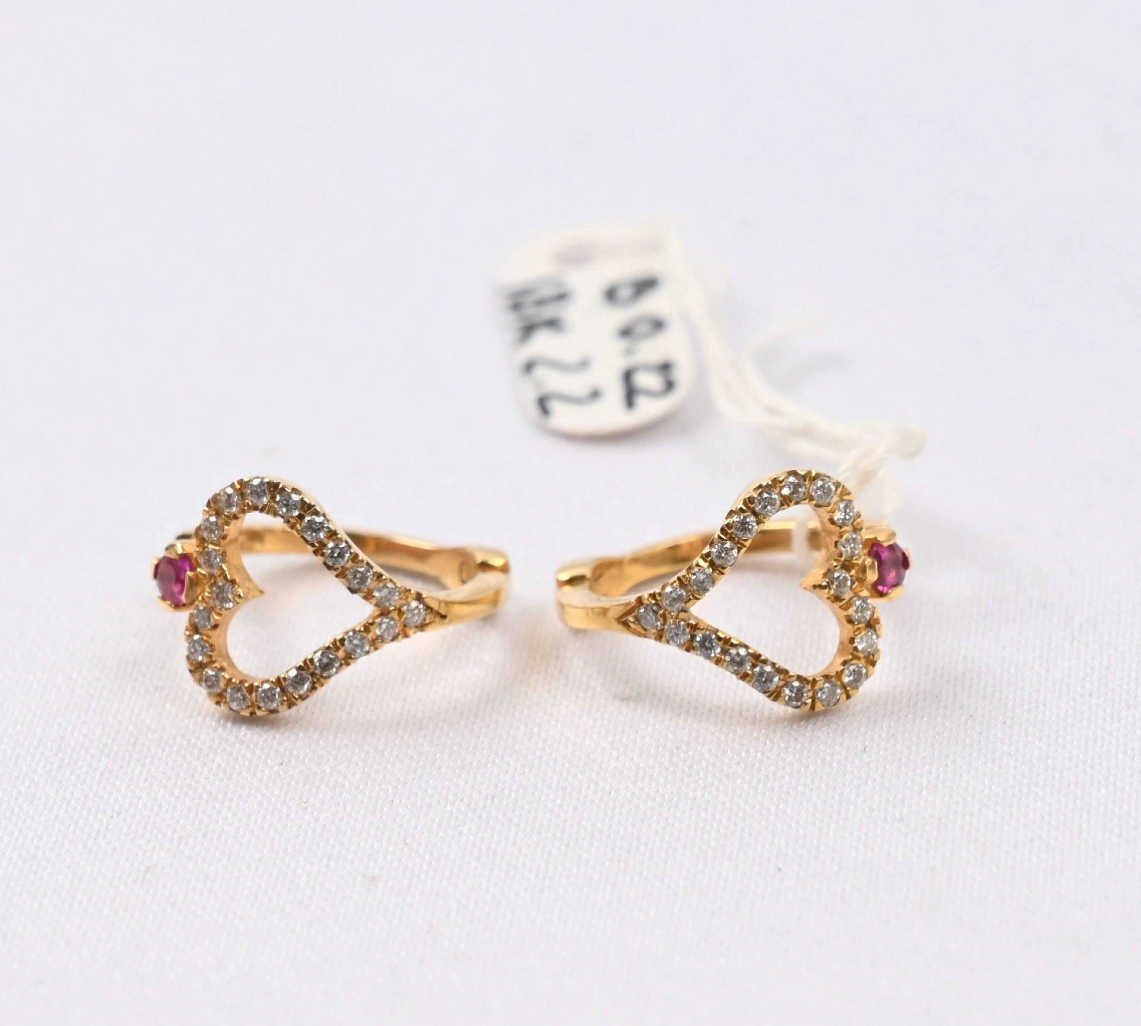 Diamond earrings (in total 0.22 CT) gold (18 k). Gross weight approximately