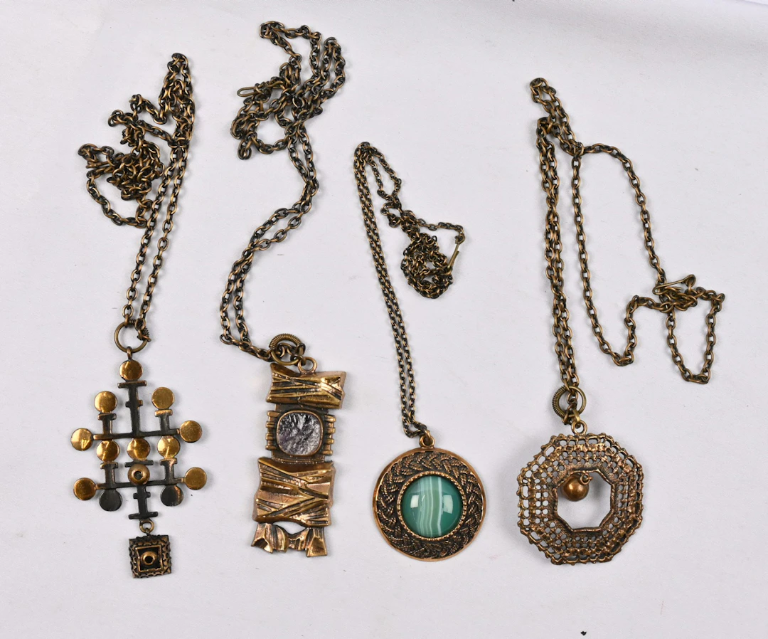 Kalevala Jewelry Pentti Sarpaneva bronze pendants with chains four