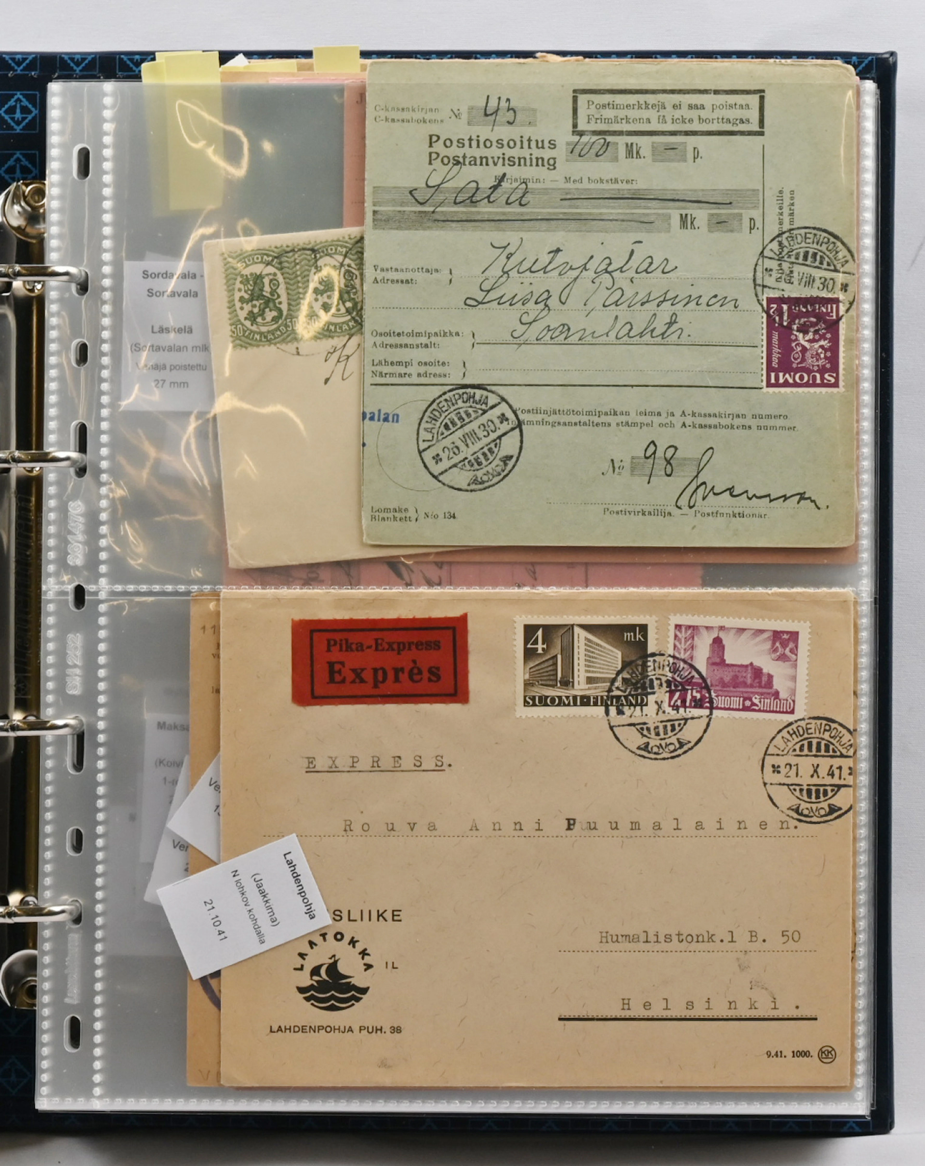 Collection material postmarks: L - R on pages in an album over 50