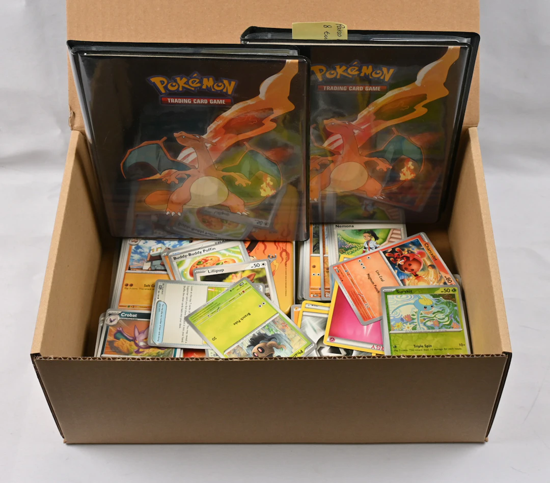 Pokémon cards selection, part of which in two small albums including