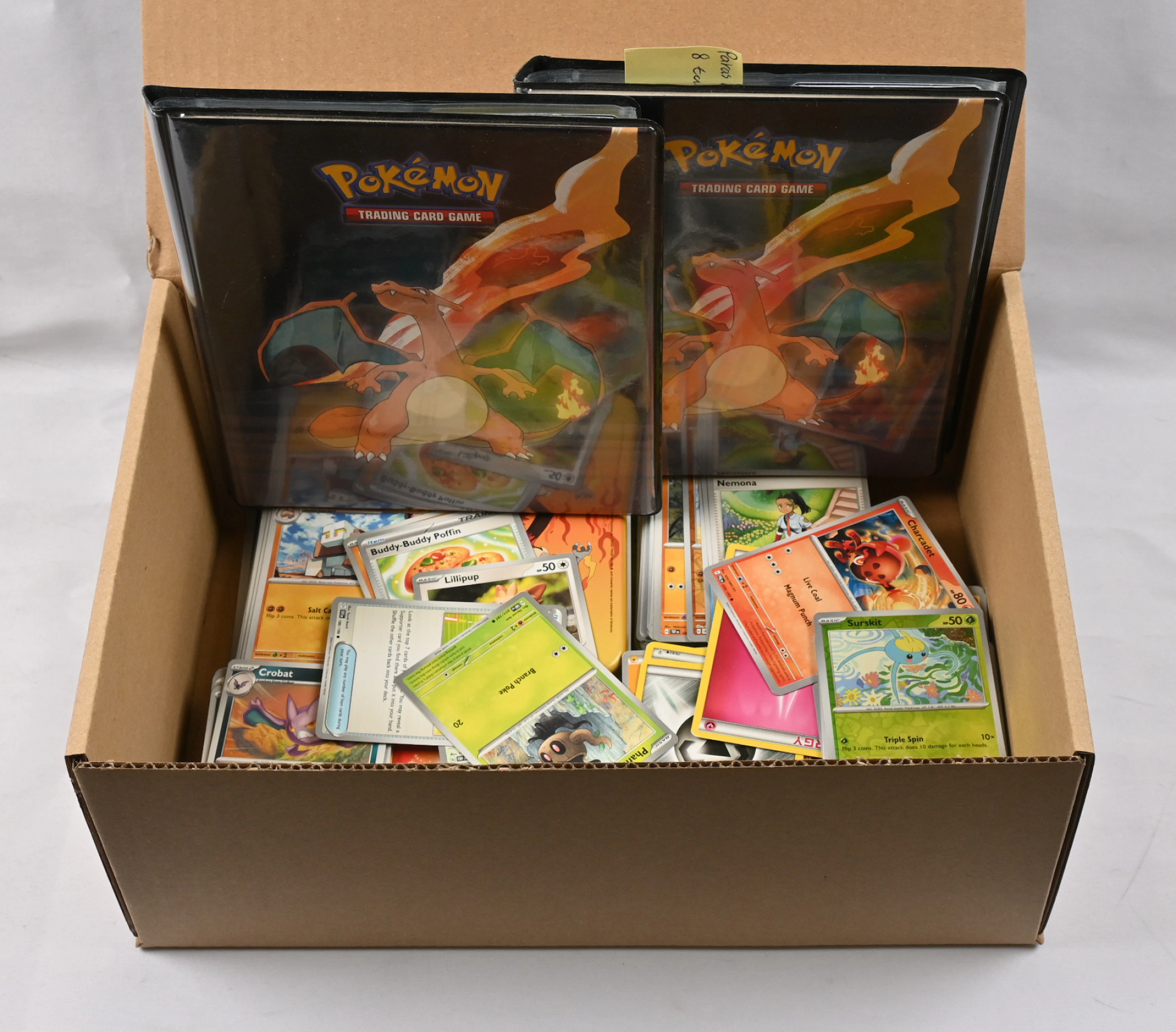 Pokémon cards selection, part of which in two small albums including