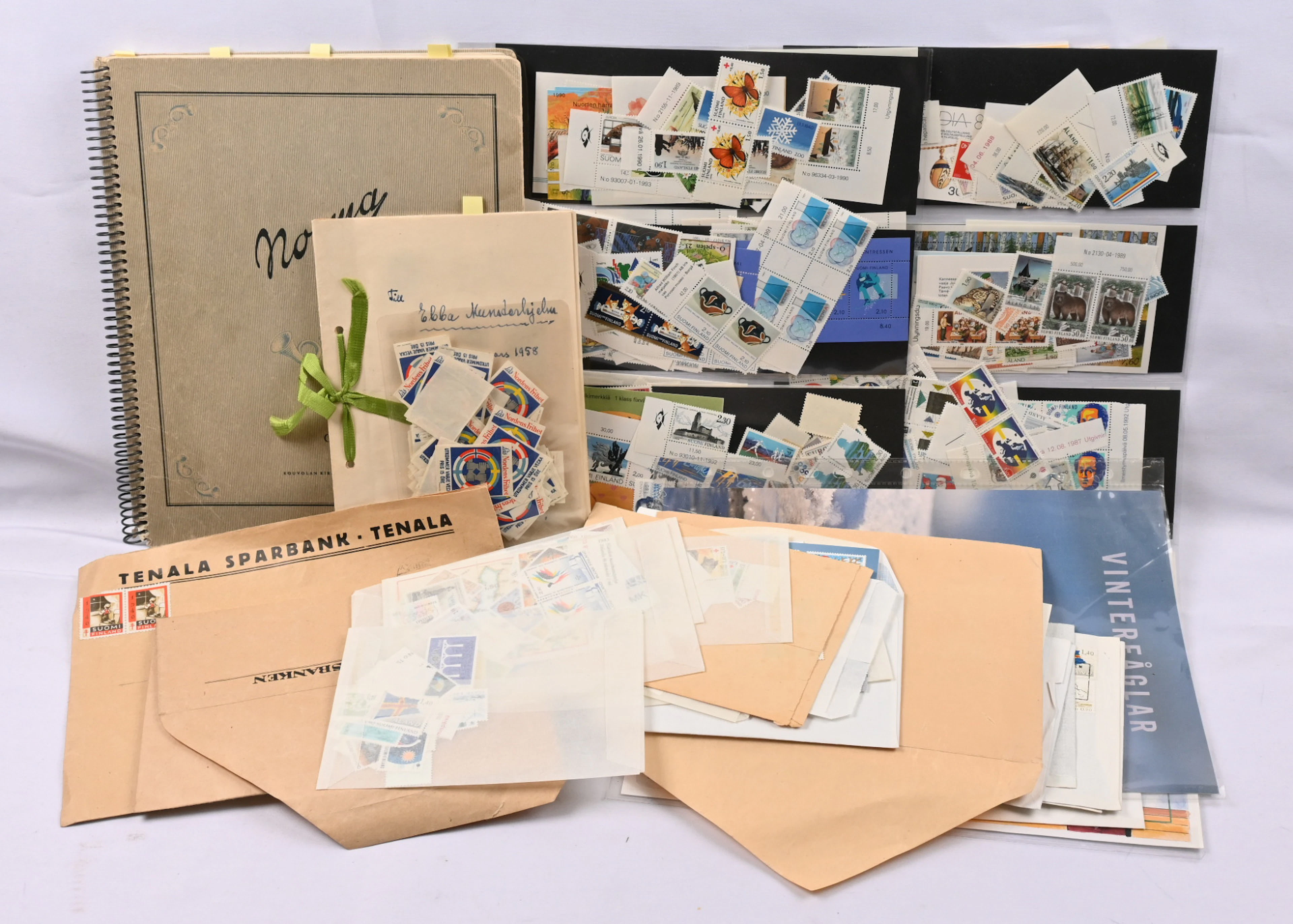 Small mixed selection in album, on pages and in bags, eg. side areas