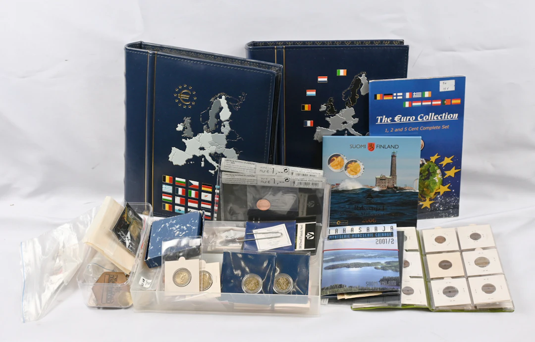 Box including euro collection in two albums and loose material. Including