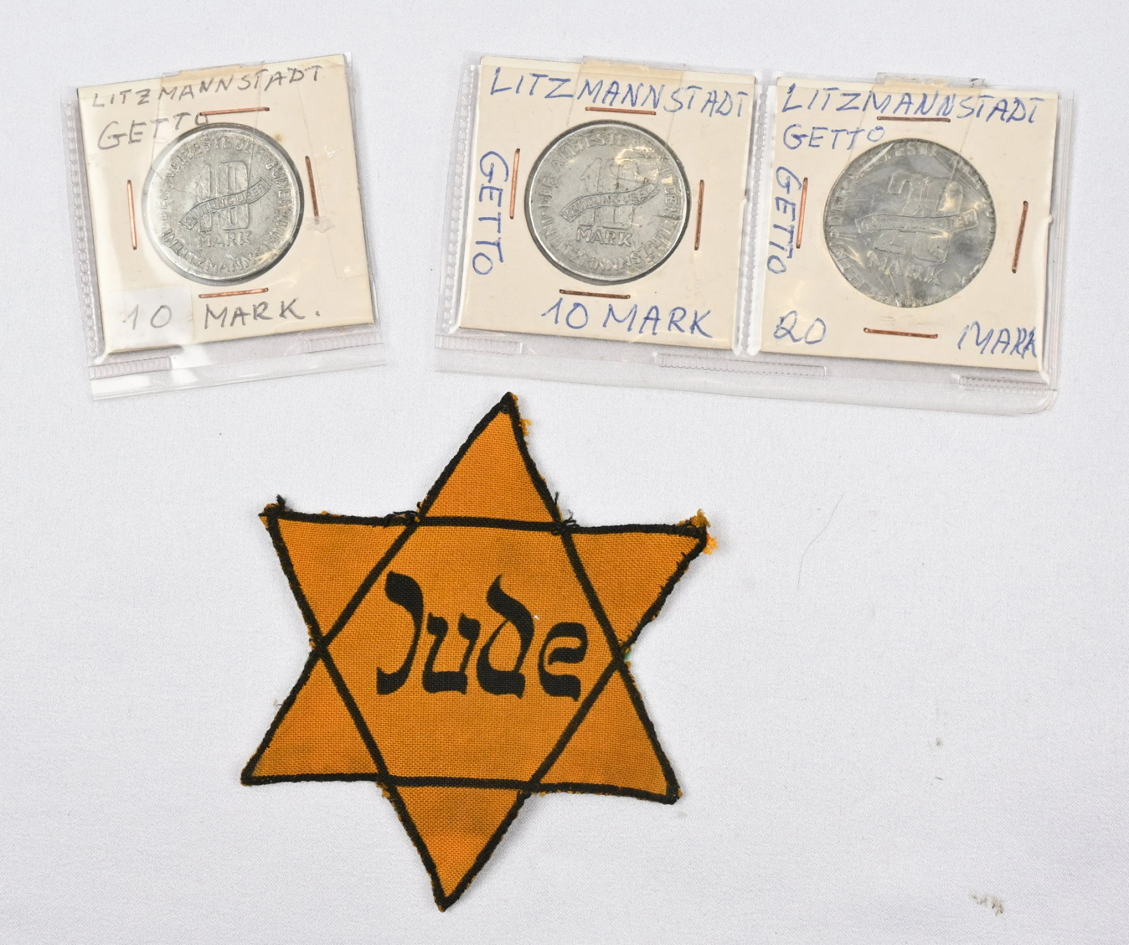 German orange Star of David badge of oppression, with the text ”Jude”