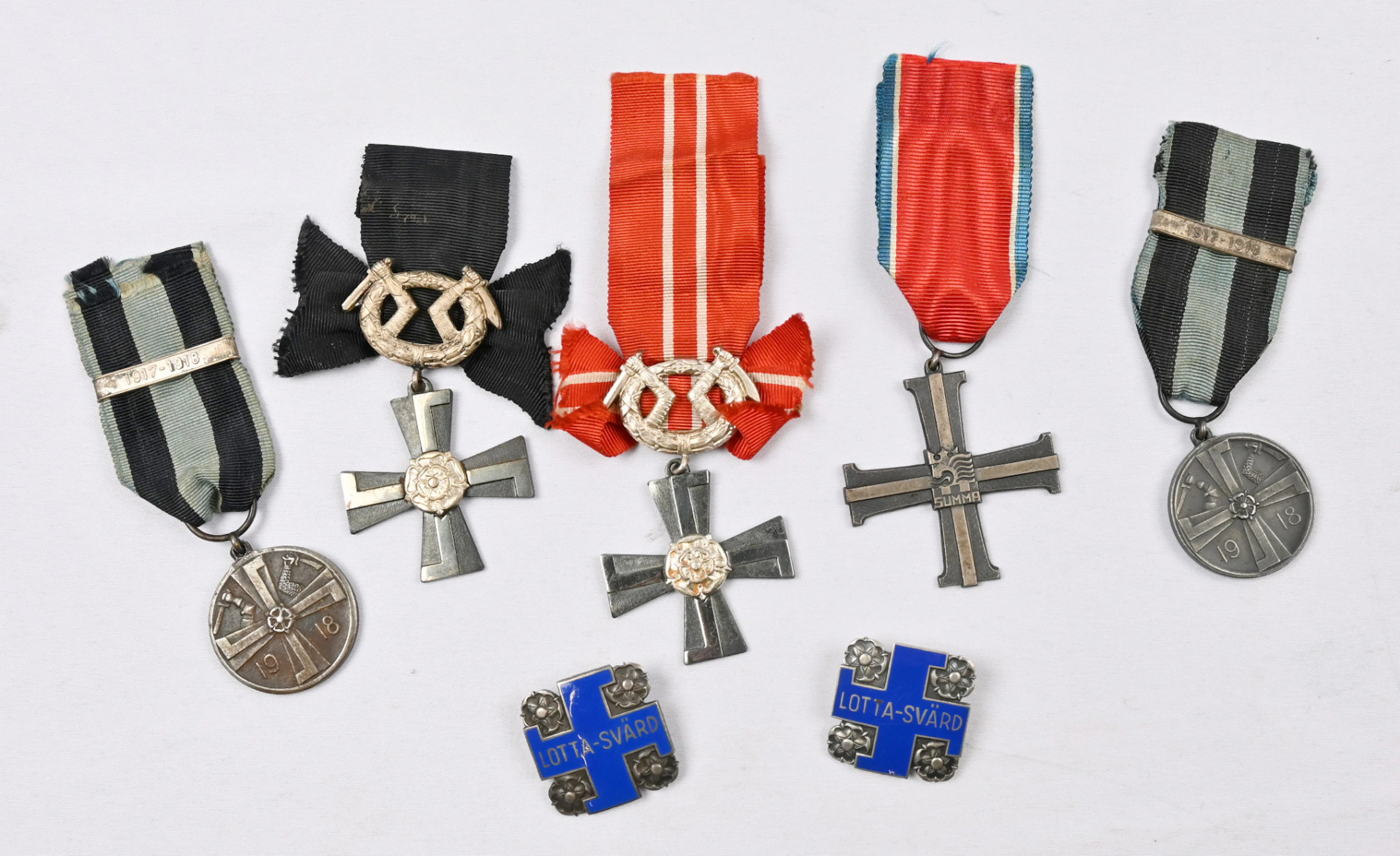 Selection of Finnish merit badges eg. Cross of Liberty 4th class with