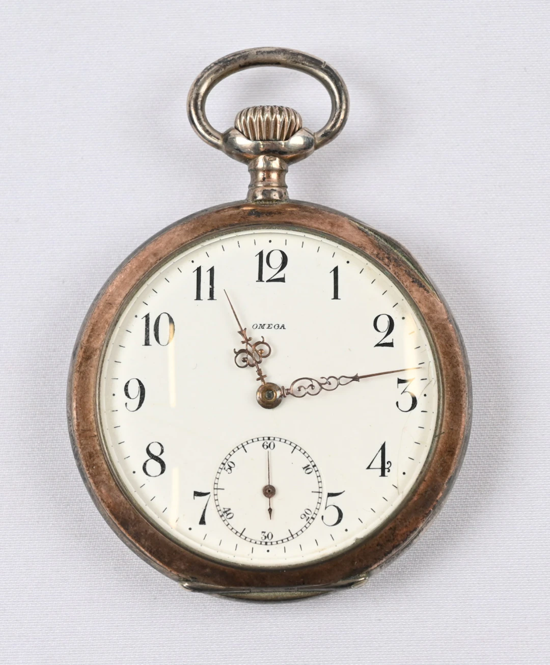 Omega silver-cased pocket watch. Normal signs of use. In working condition