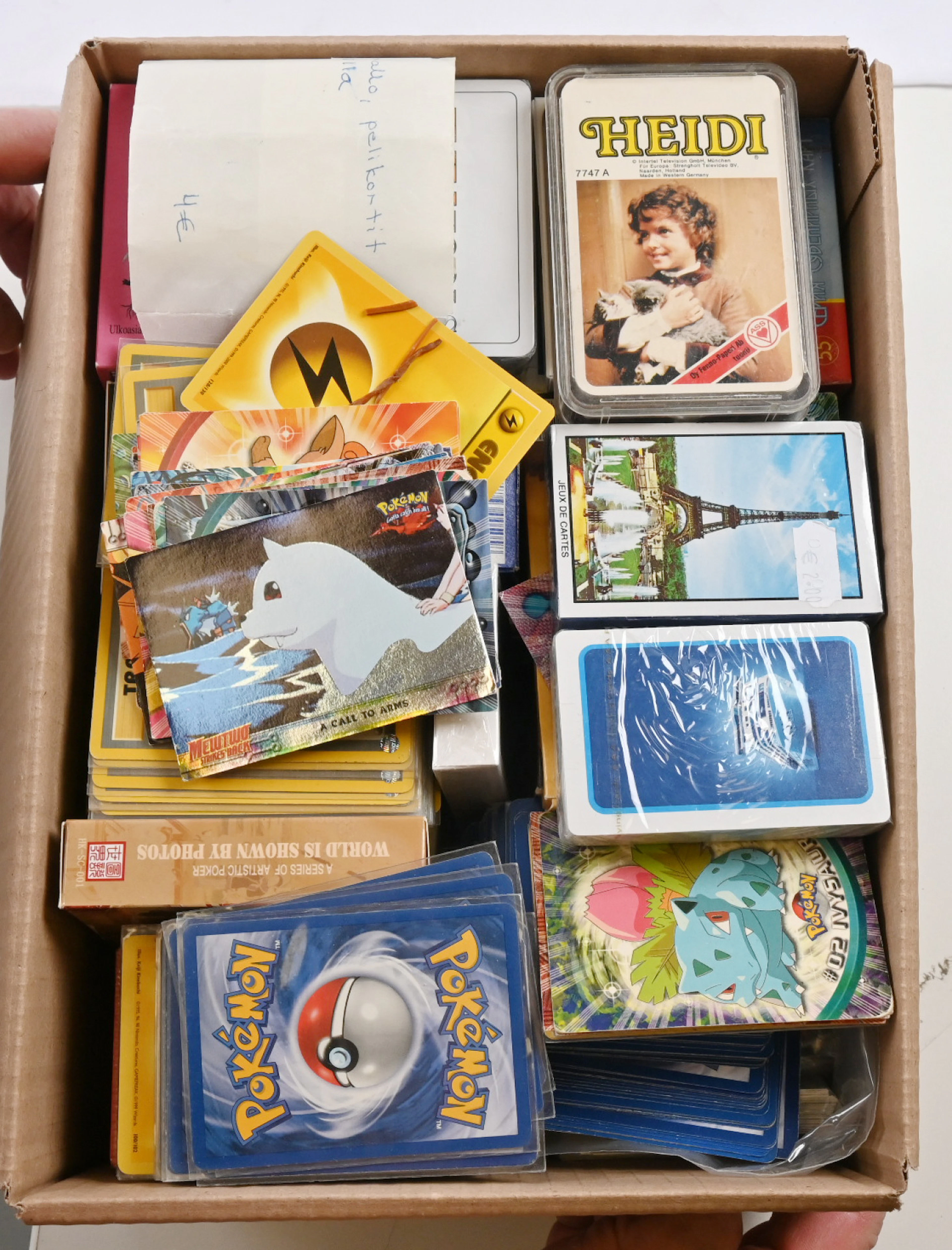 Playing cards over 60 packs, mainly unopened. Also a little bit of