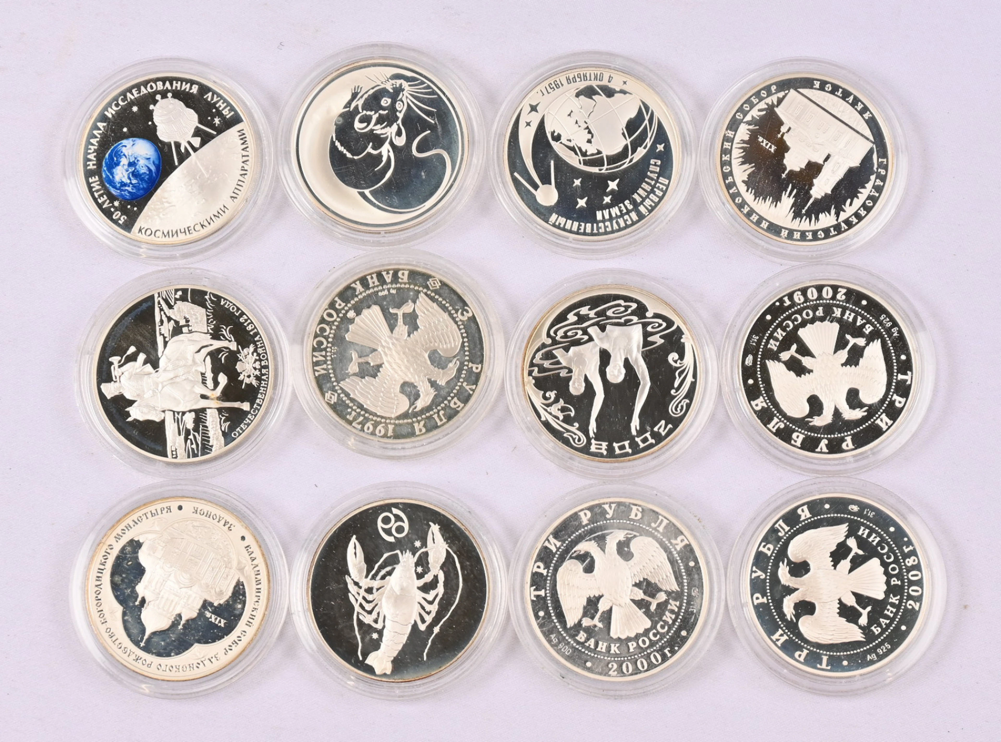 1997 - 2012 12 silver 3 rouble commemorative coins in capsules. Mostly