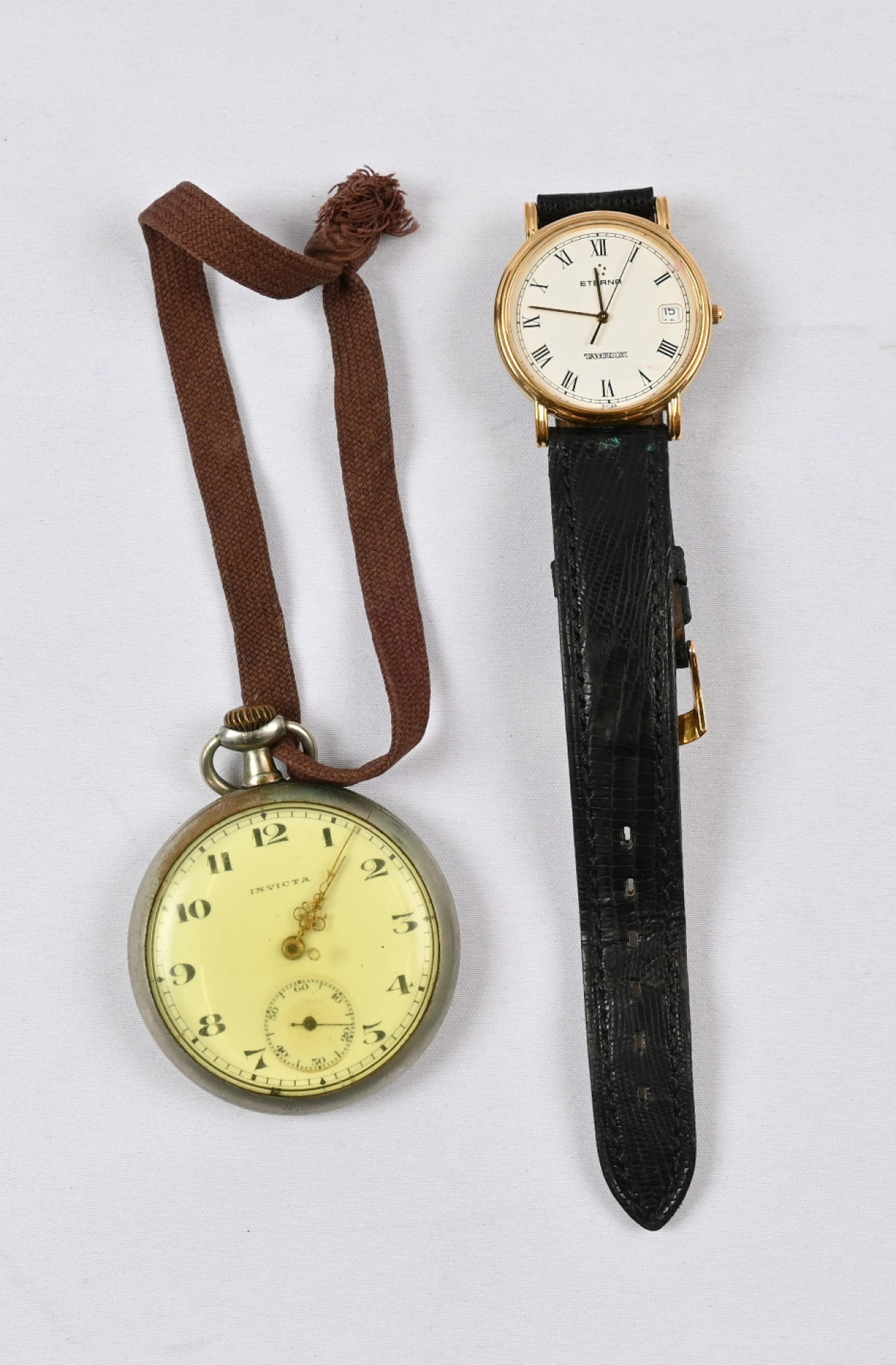 Invicta working pocket watch and Eterna wristwatch with engravings