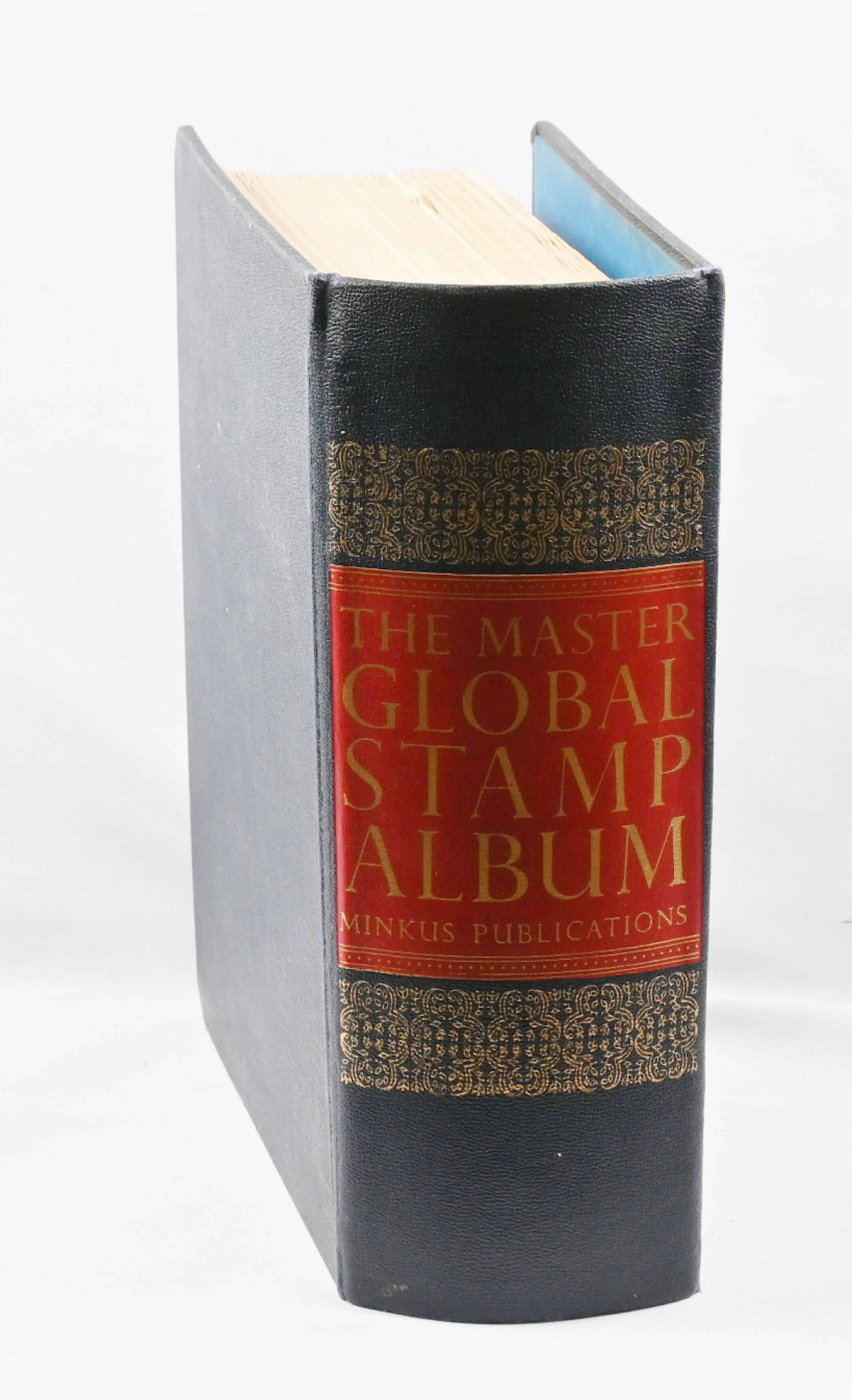 Minkus worldwide album where stamp spaces up to around year 1953.