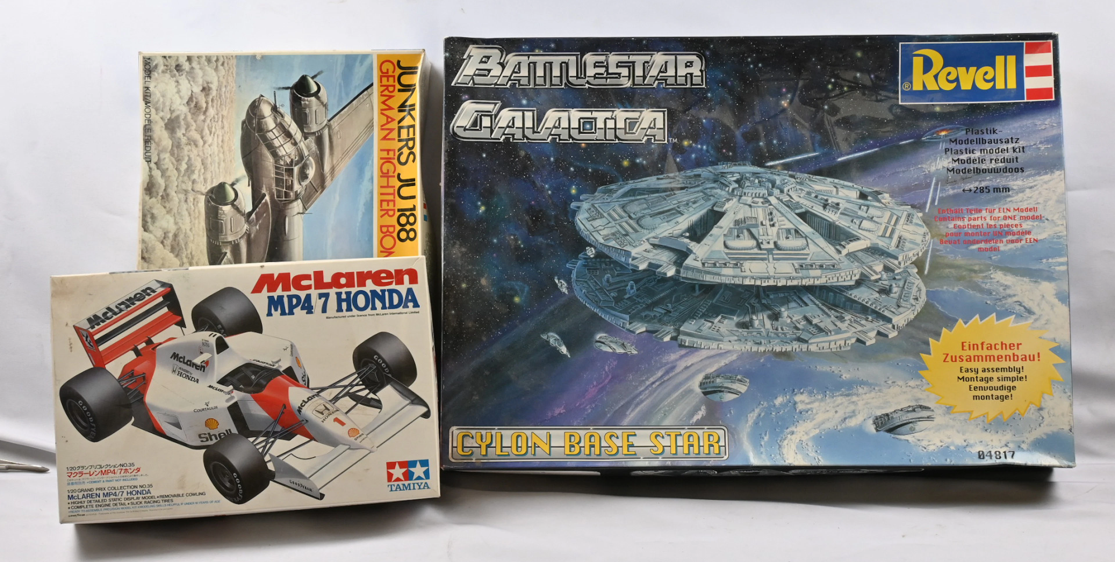 Toys, three assembly model kits in their packages, including eg. Revell's