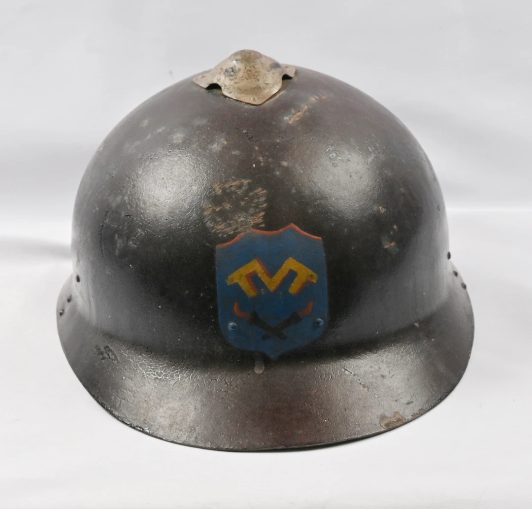 War-time helmet of the Turku Woollen Mill (Turun Verkatehdas). Patina of age.