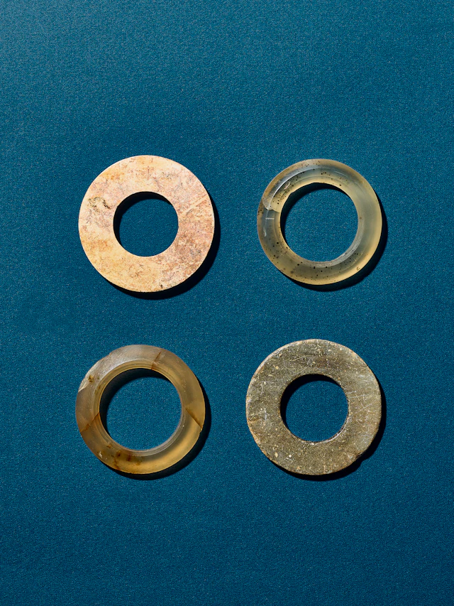 A Group of Two Jade Rings and Two Agate Rings