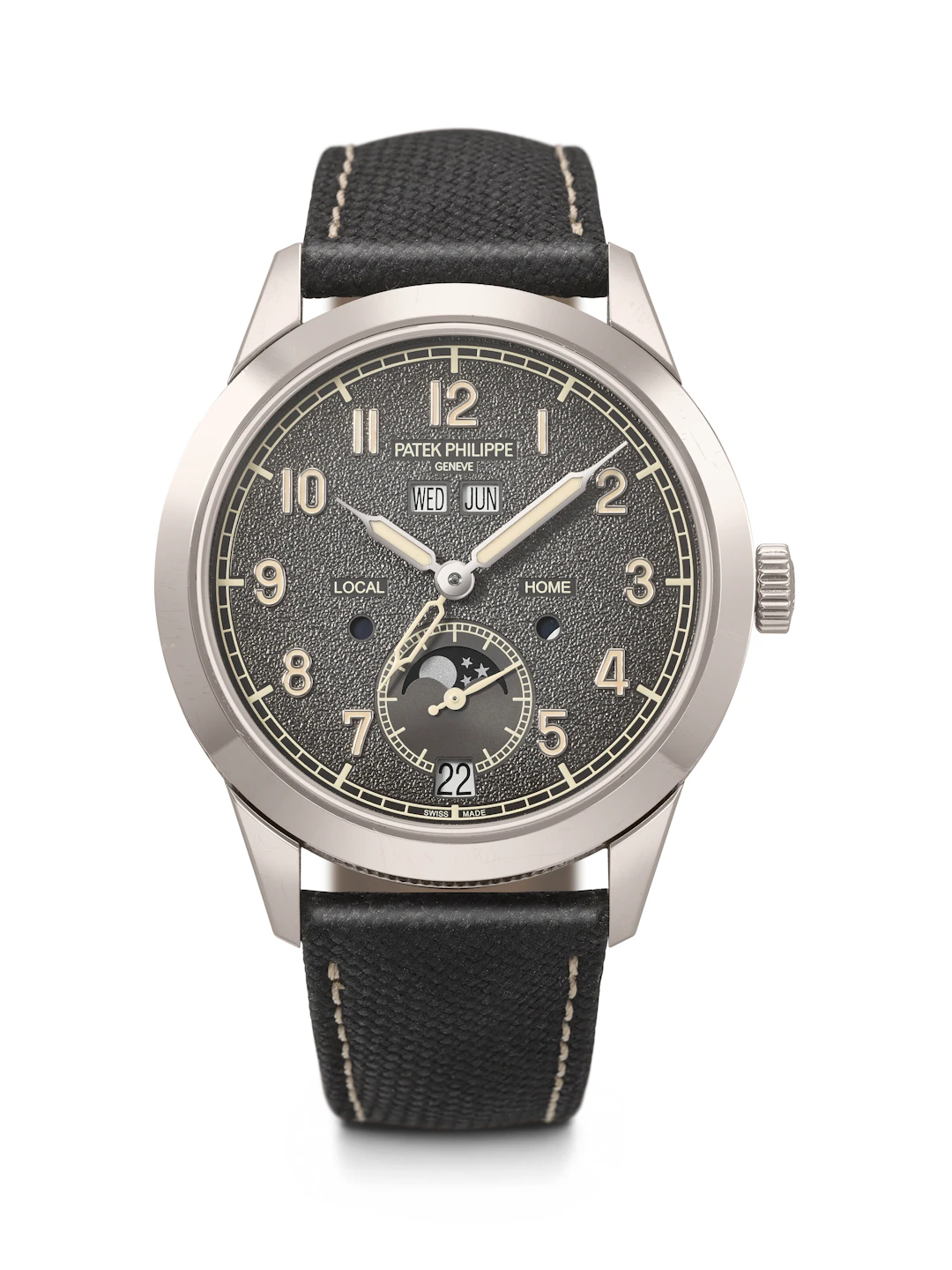 Patek Philippe. An Attractive 18K White Gold Automatic Annual Calendar